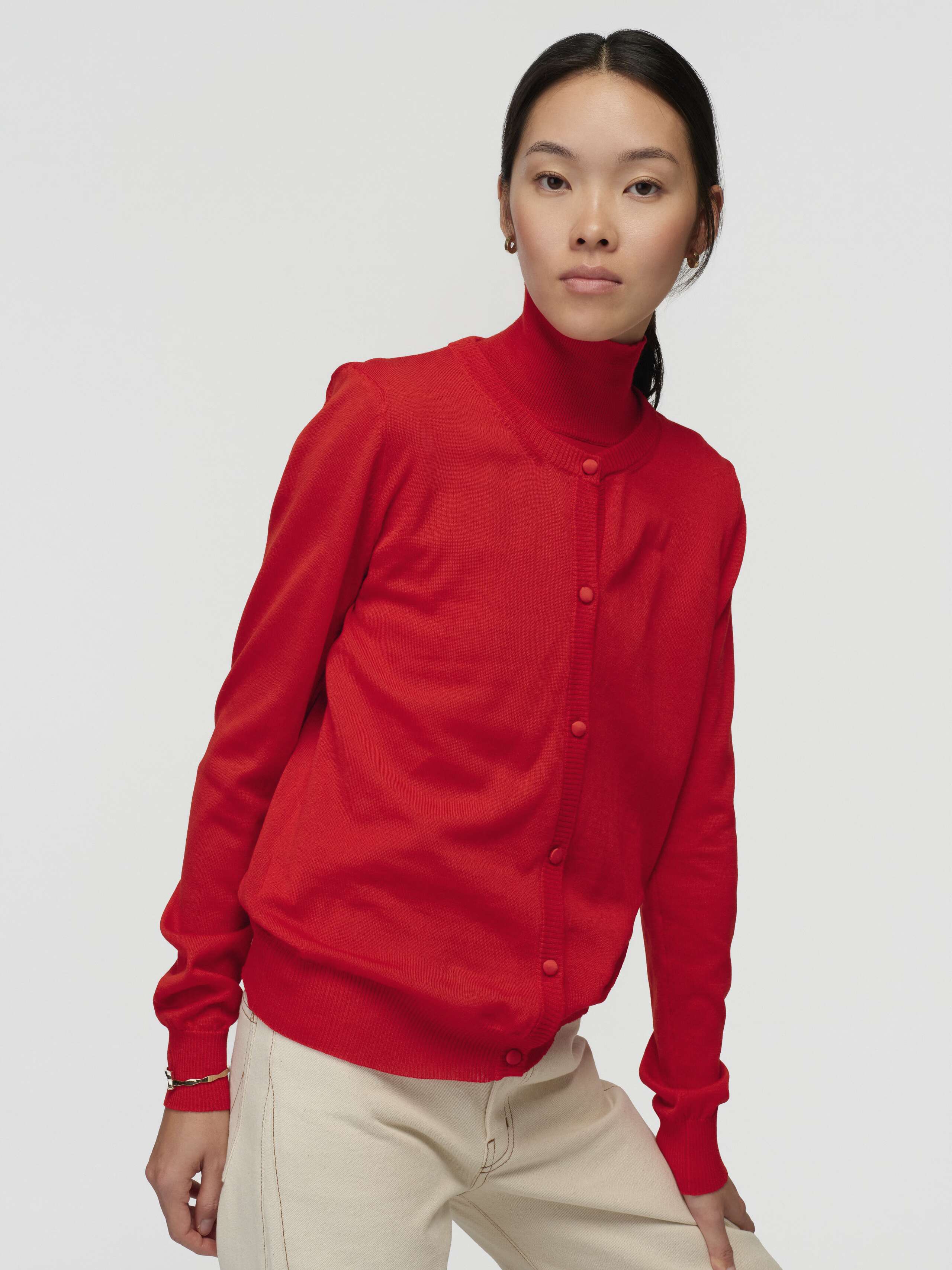 Model Wearing Bea Cardigan in Warm Red