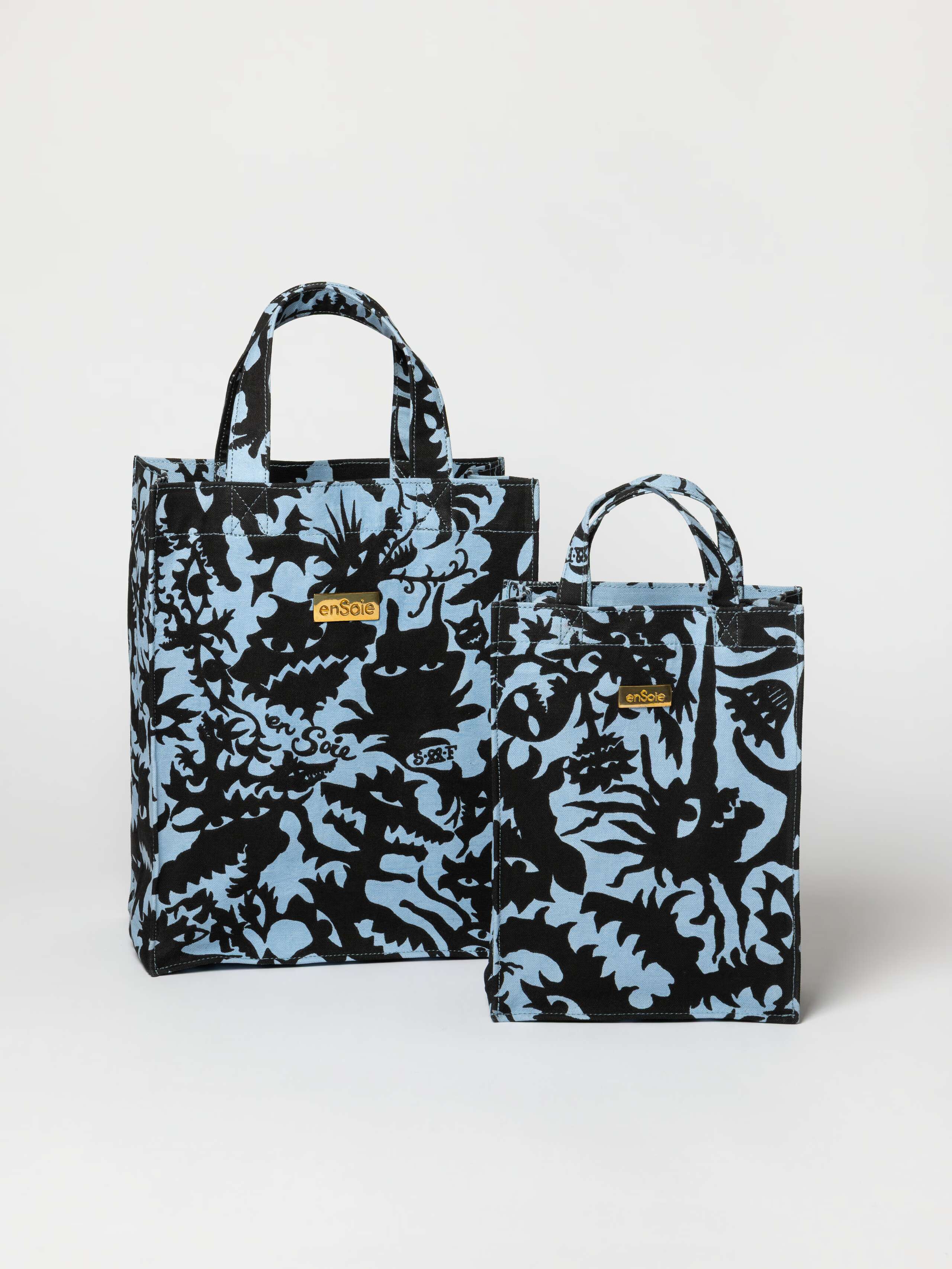 Product Shot of Cabas Bag (S & M) in Monster Print in Lt. Blue / Black