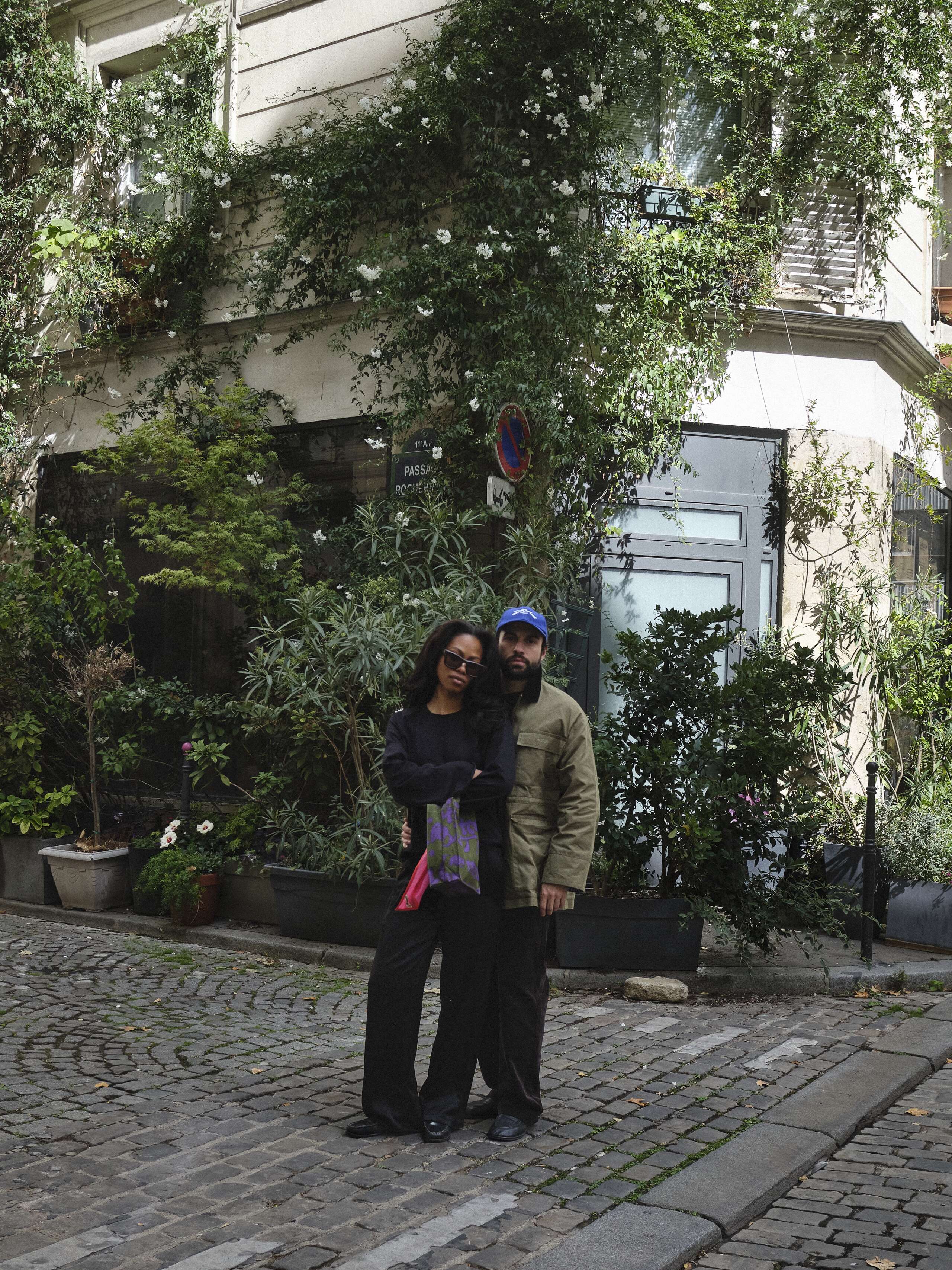 Picture of a couple walking through the streets of Paris.