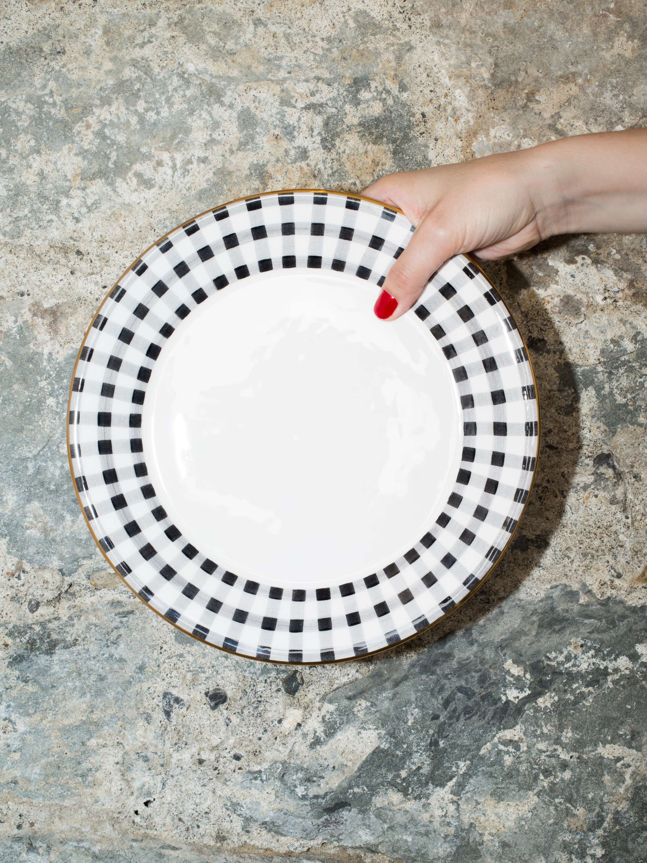 person holding plate 