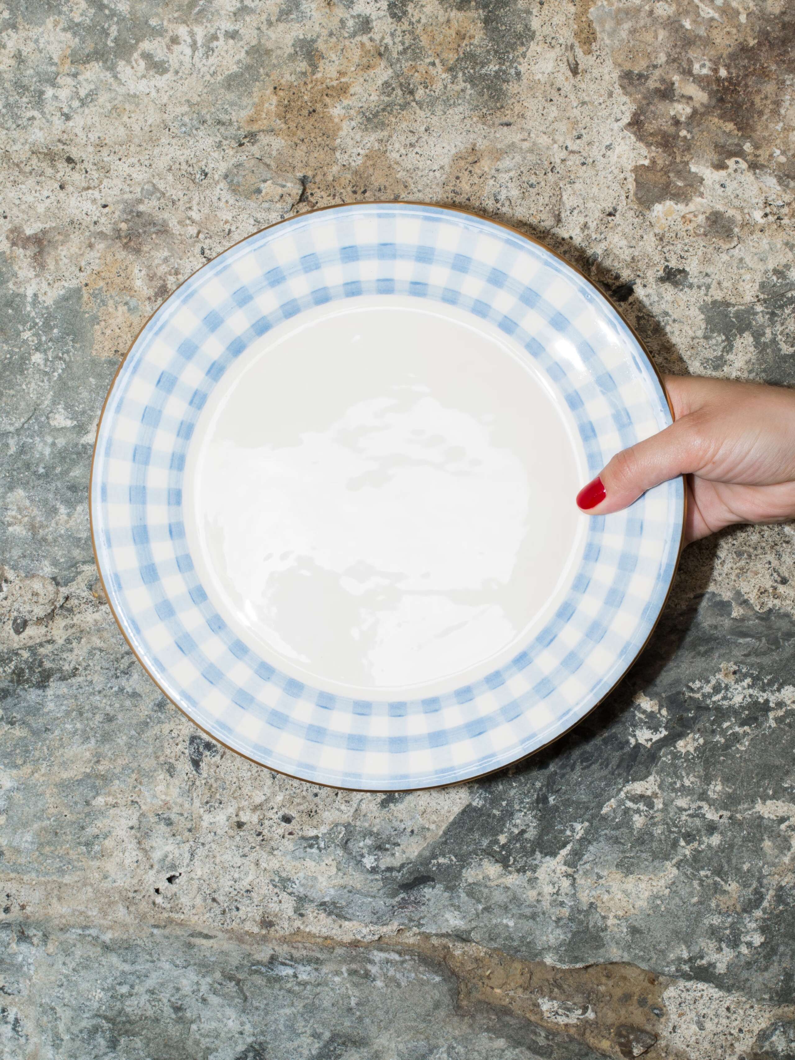 person holding plate 