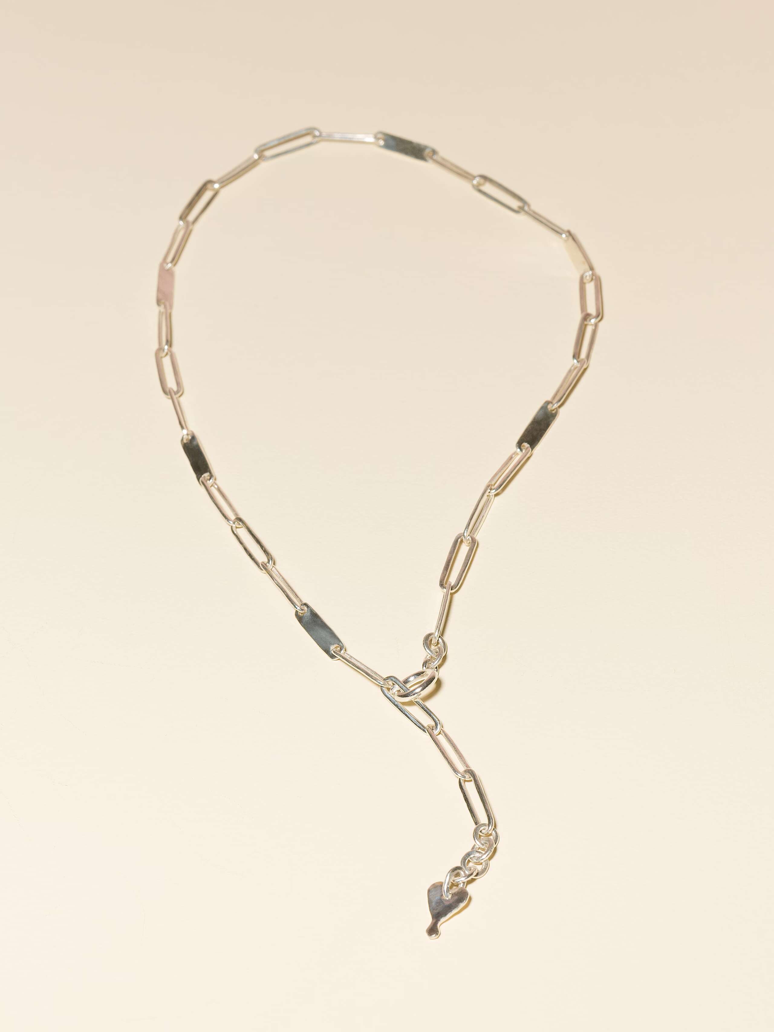 harper sterling silver chain on plain background