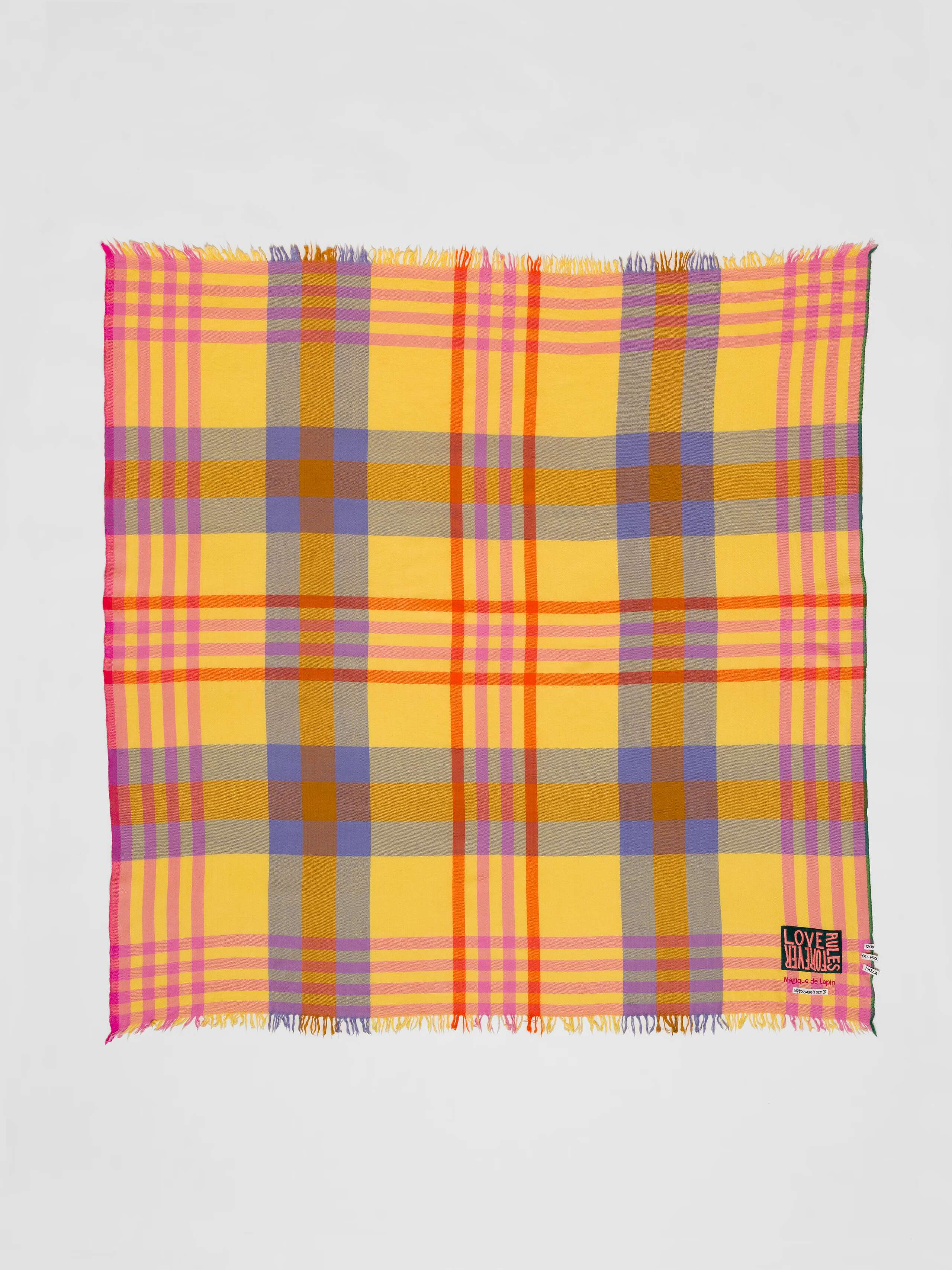 Picture of a colourful wool scarf in yellow, lavender, pink and orange shades