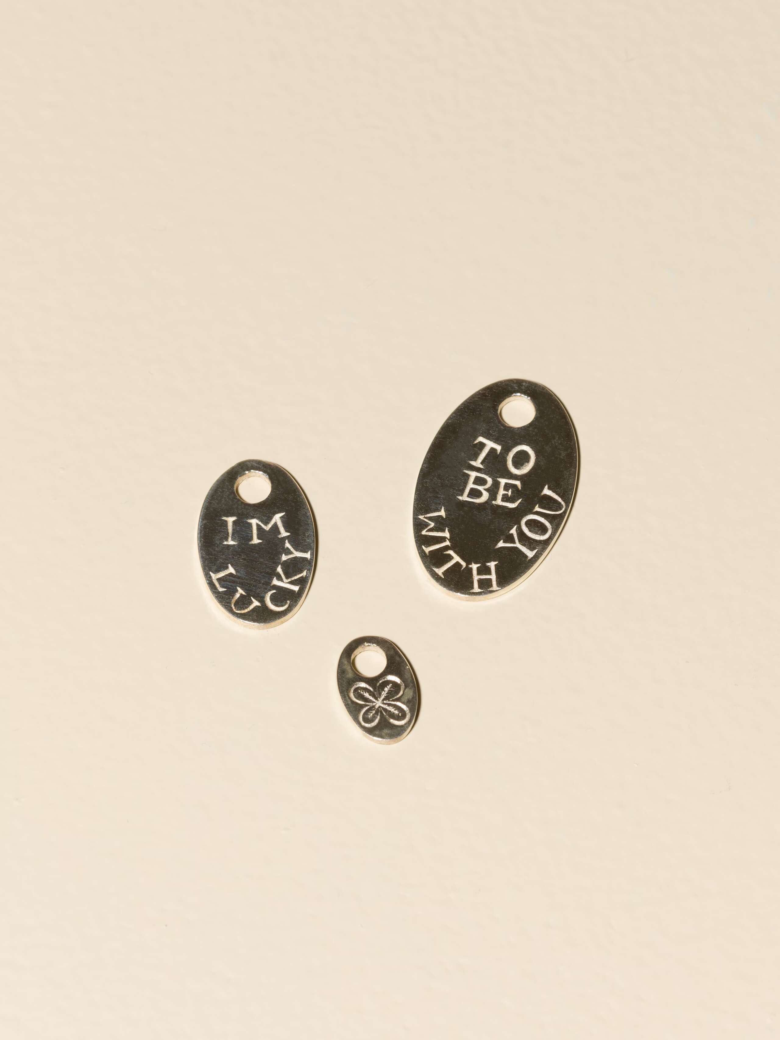 picture of the oval tags on a creole sterling silver