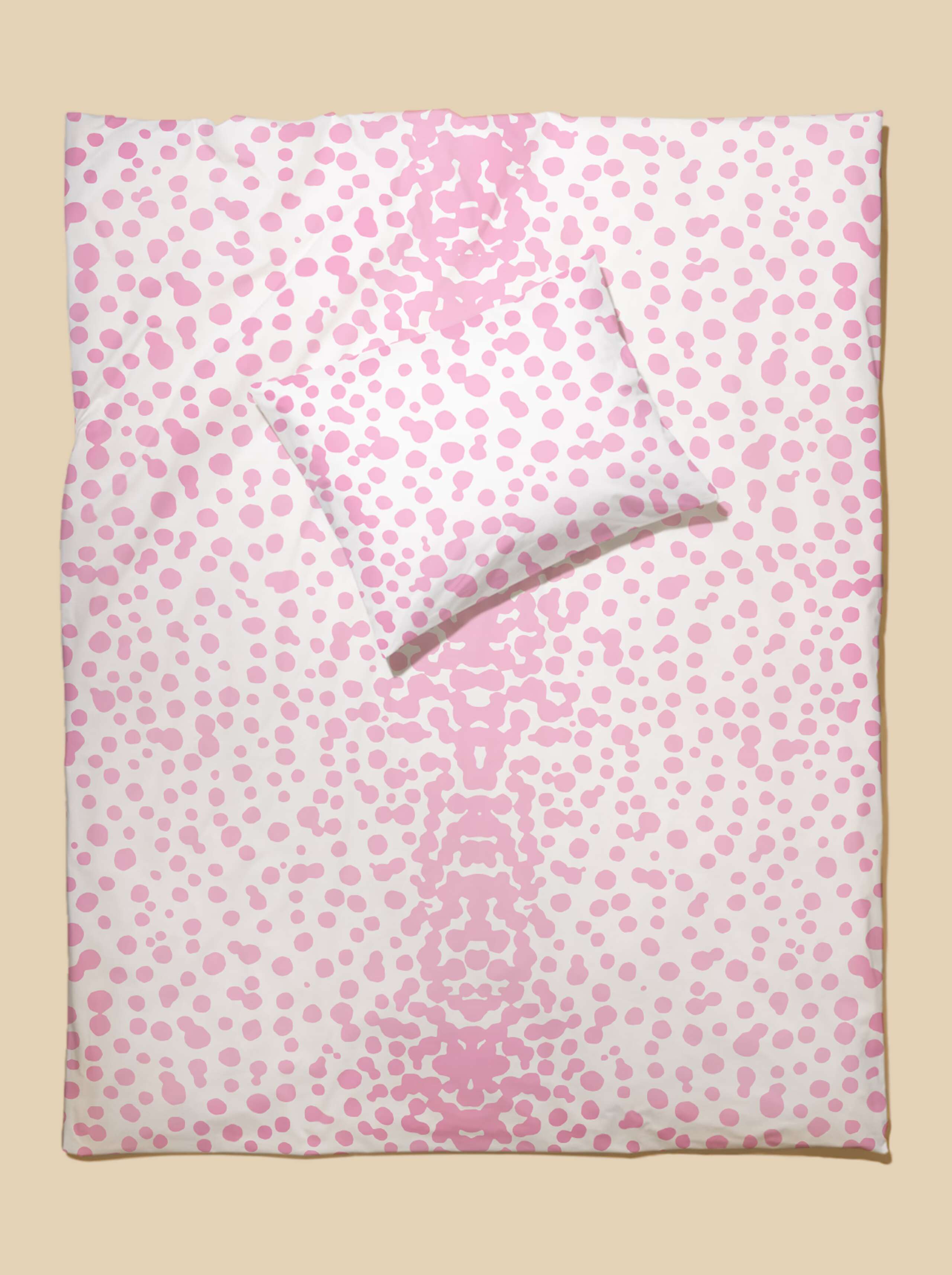 Picture of bed linen featuring a beautiful leo dot pattern in pink
