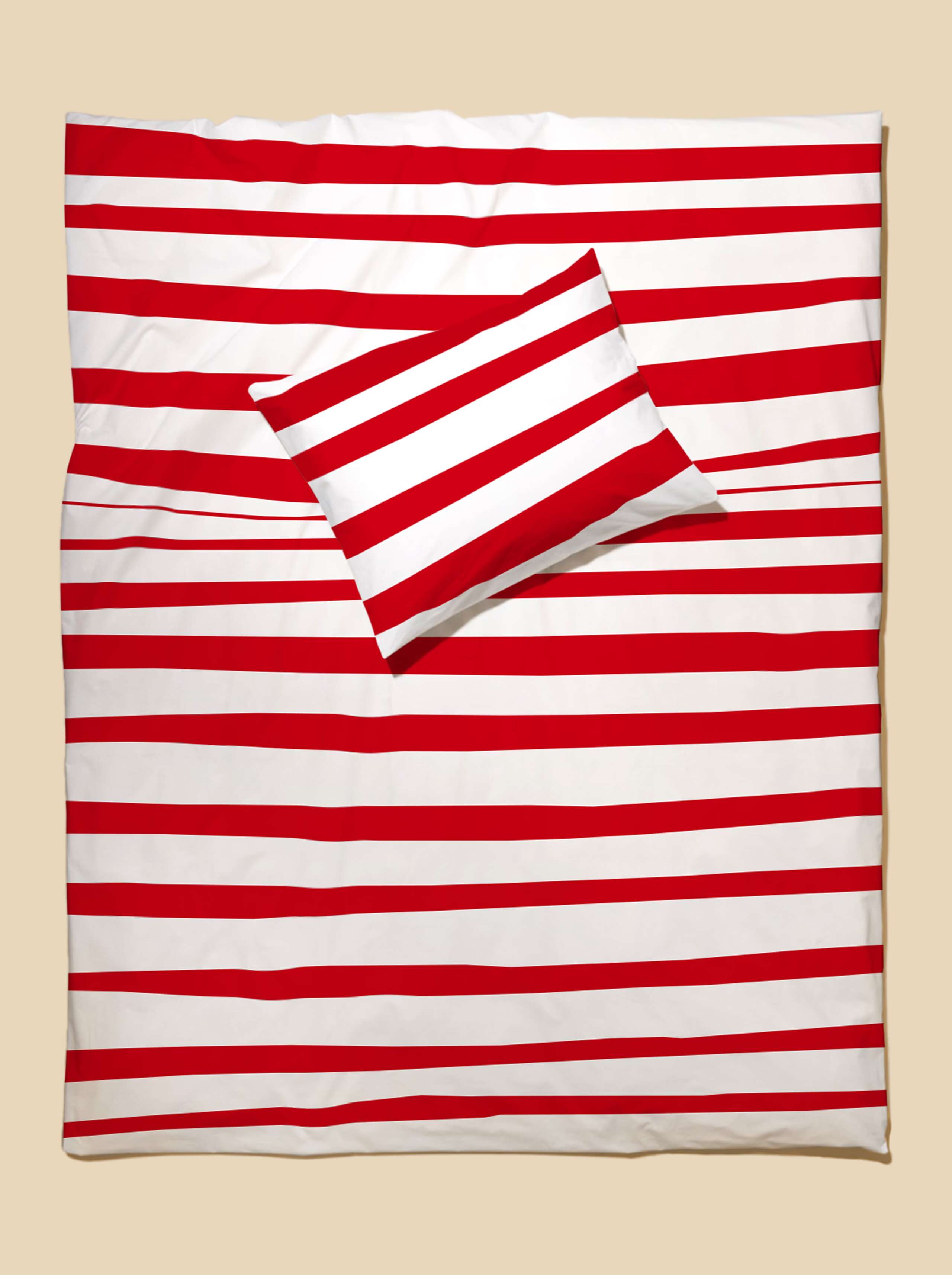Picture of bed linen featuring a beautiful stripe pattern in red