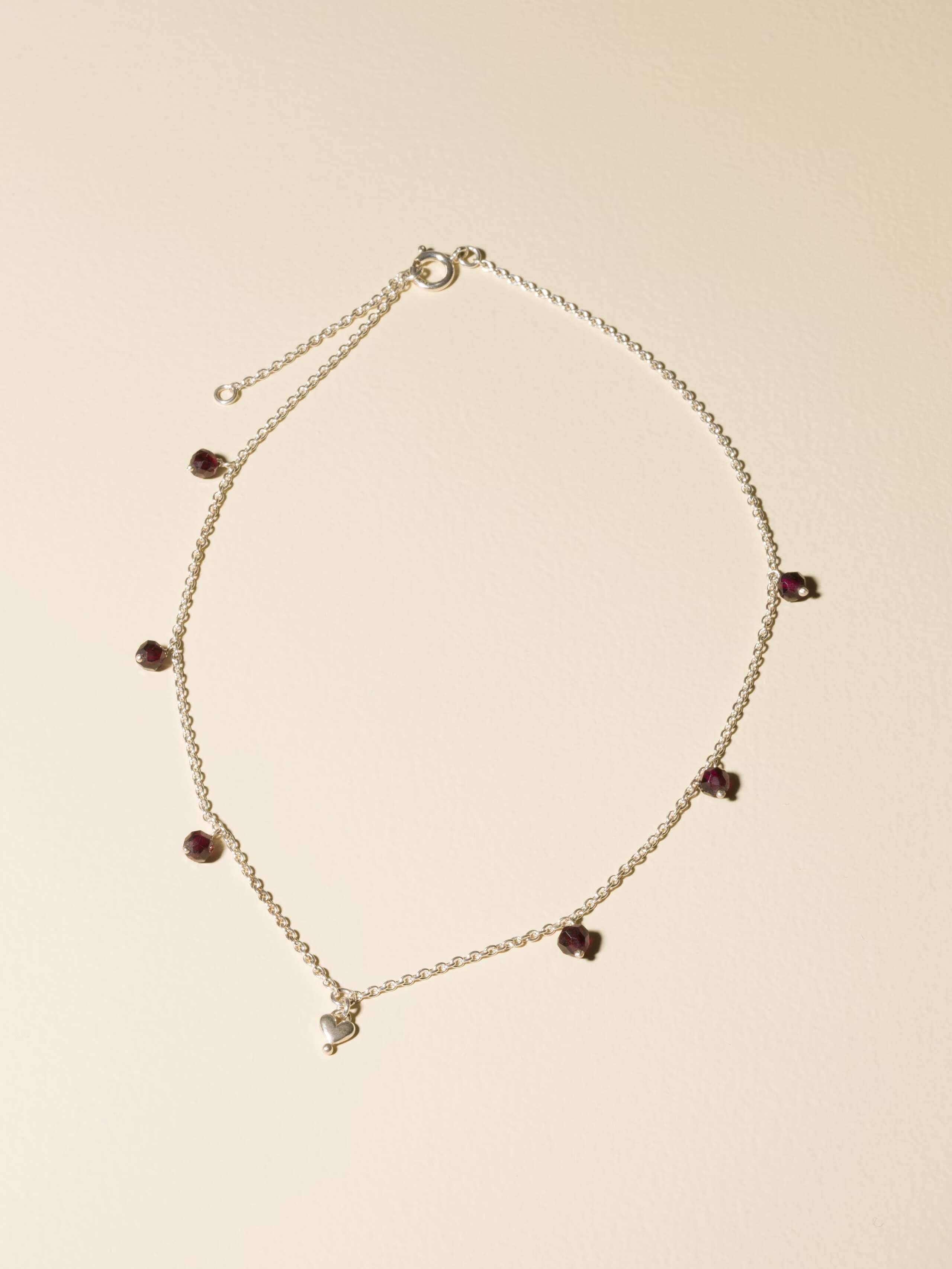 Zoe necklace with red garnet stone