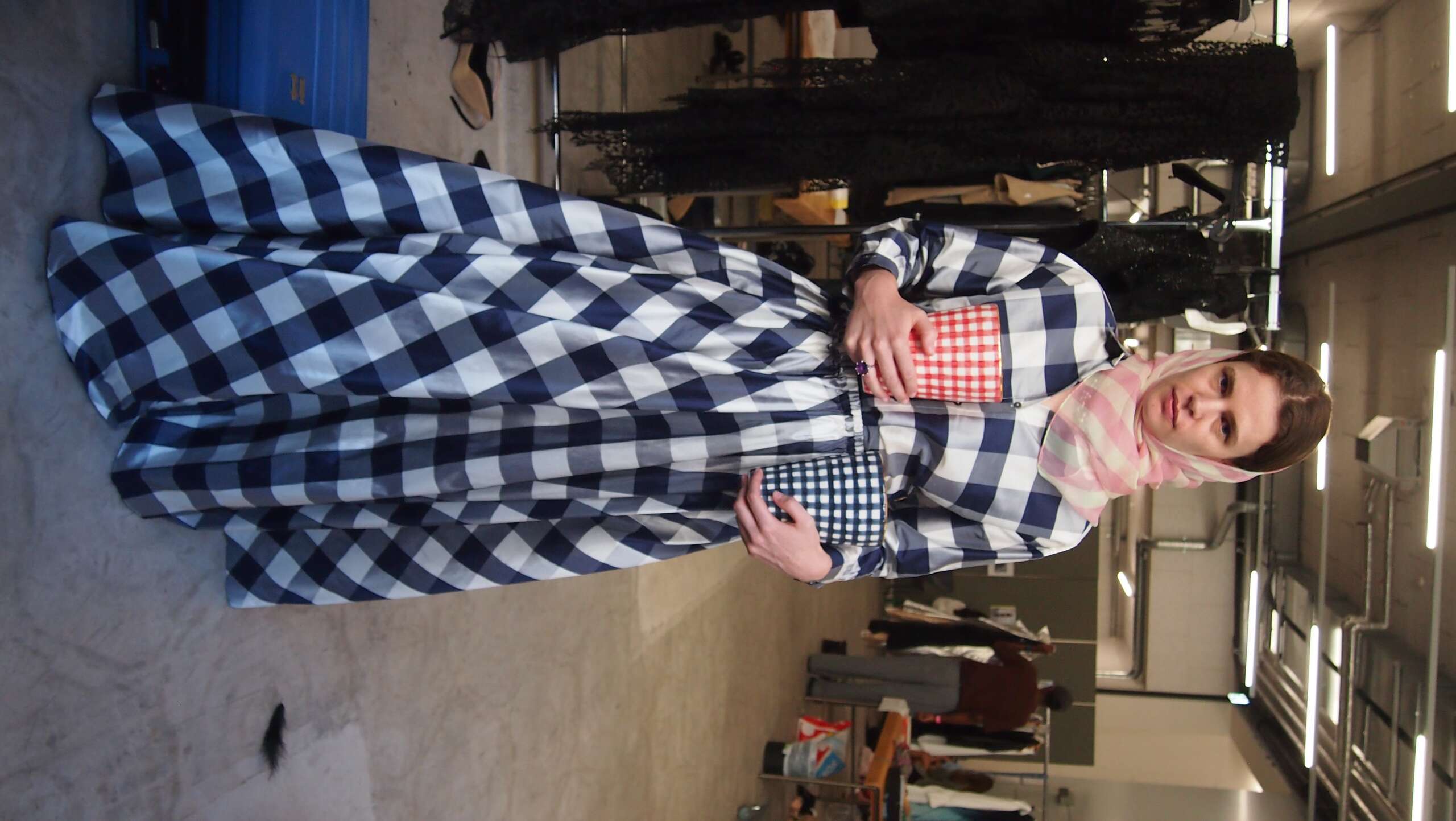 Picture of a model in the backstage of a fashion show