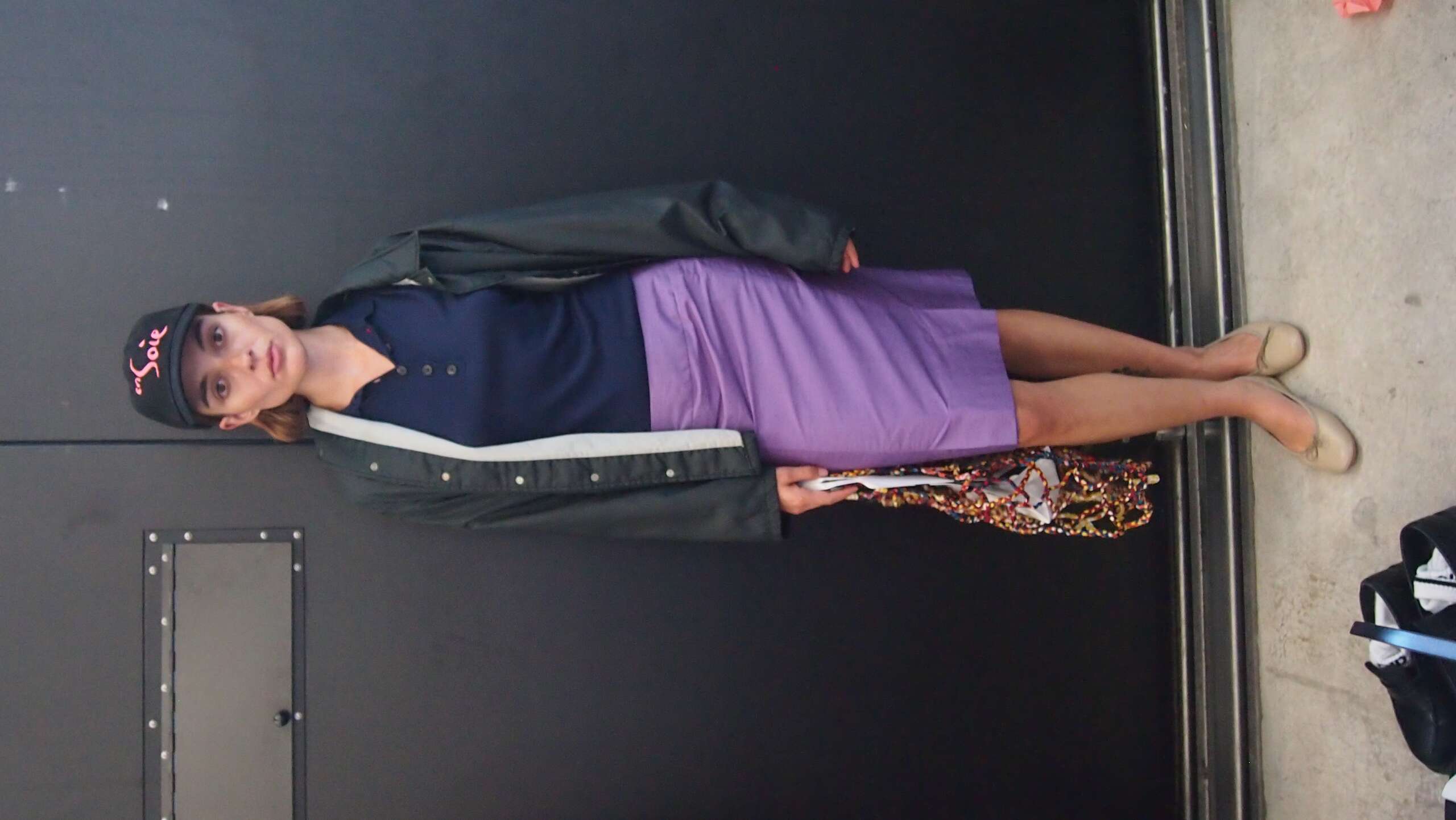 Picture of a model in the backstage of a fashion show