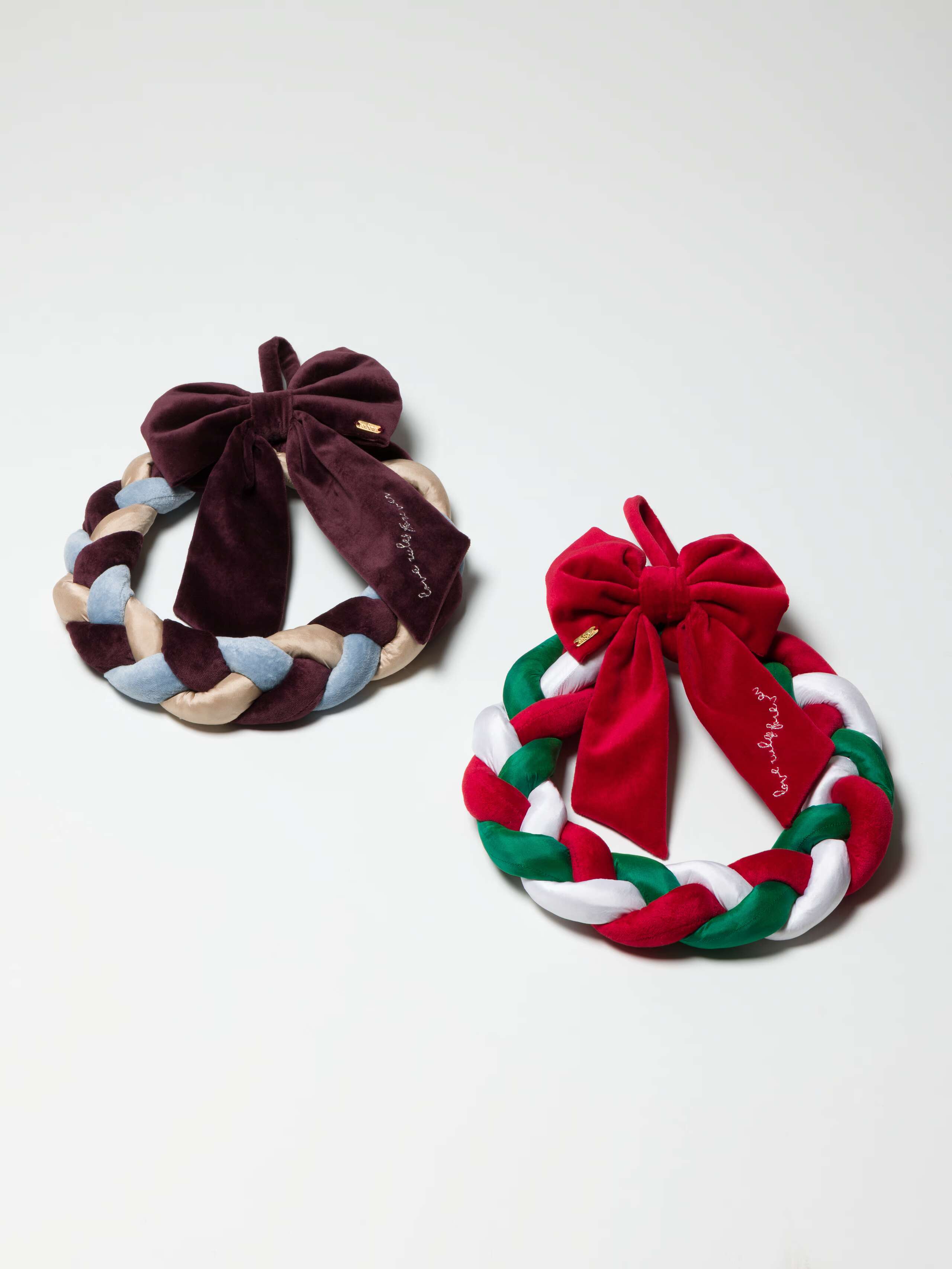 Picture of two Christmas wreaths made of velvet and silk