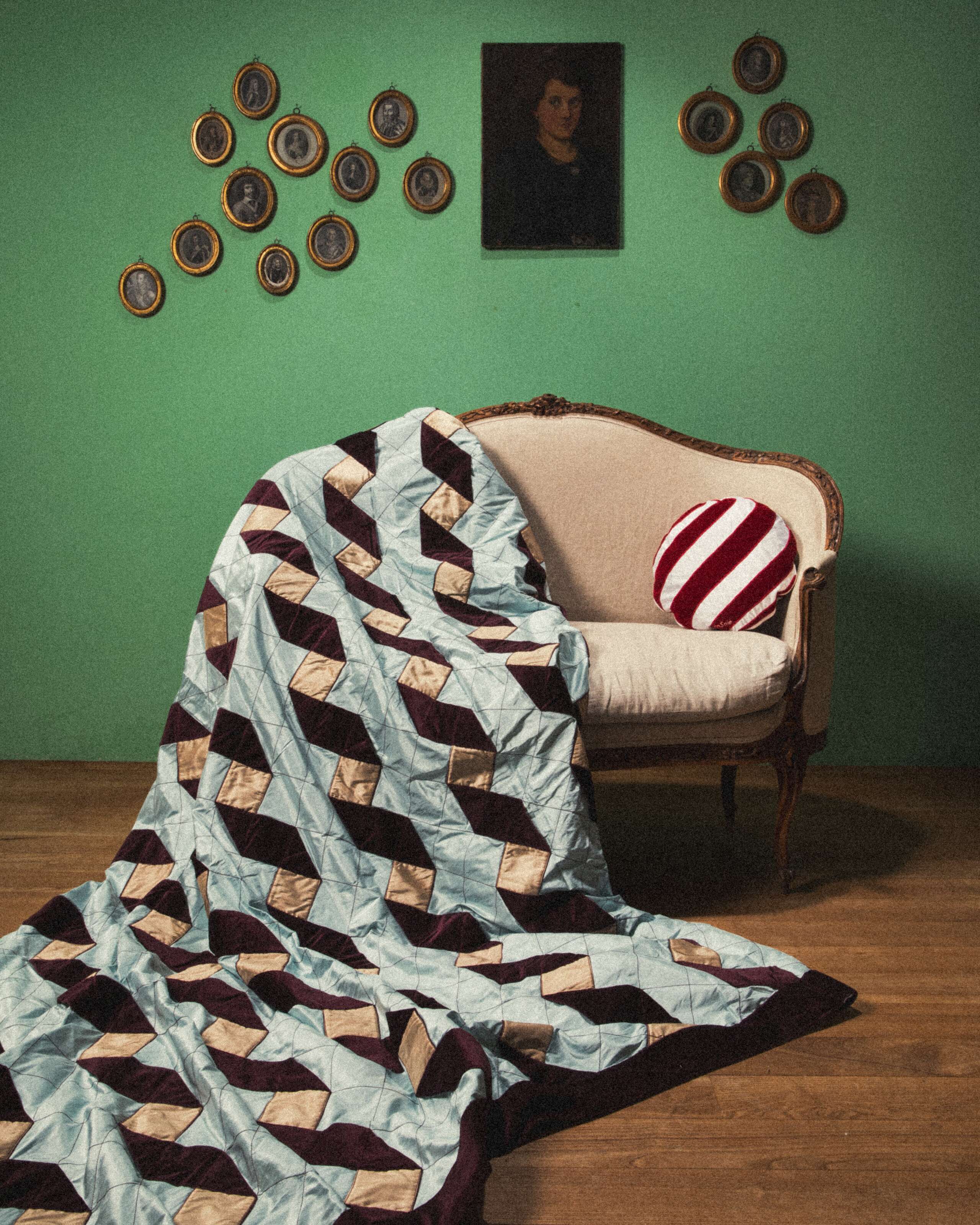Picture of a beautiful quilt made from silk and velvet