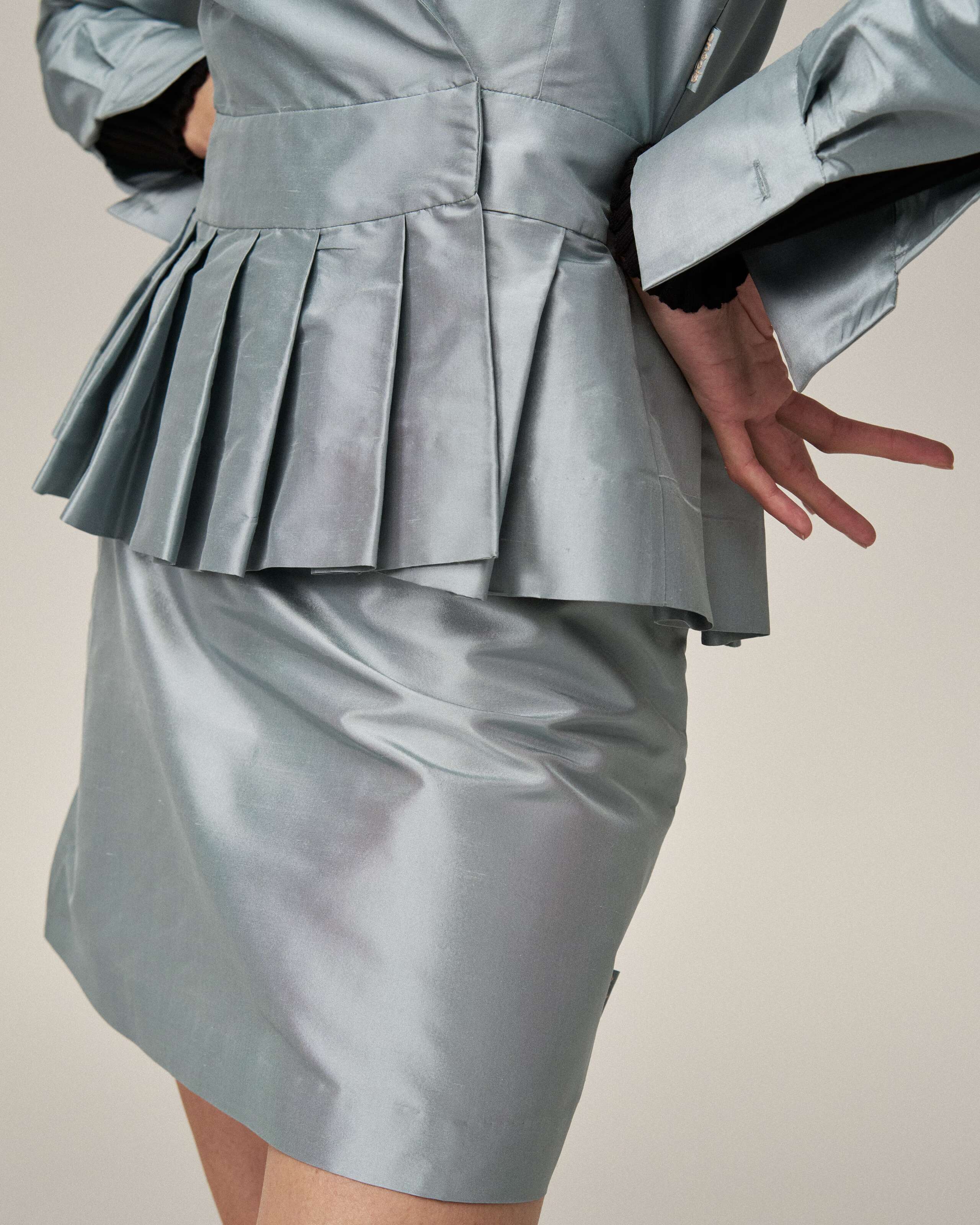 Model wearing Ilsa skirt in dream blue doupion silk 