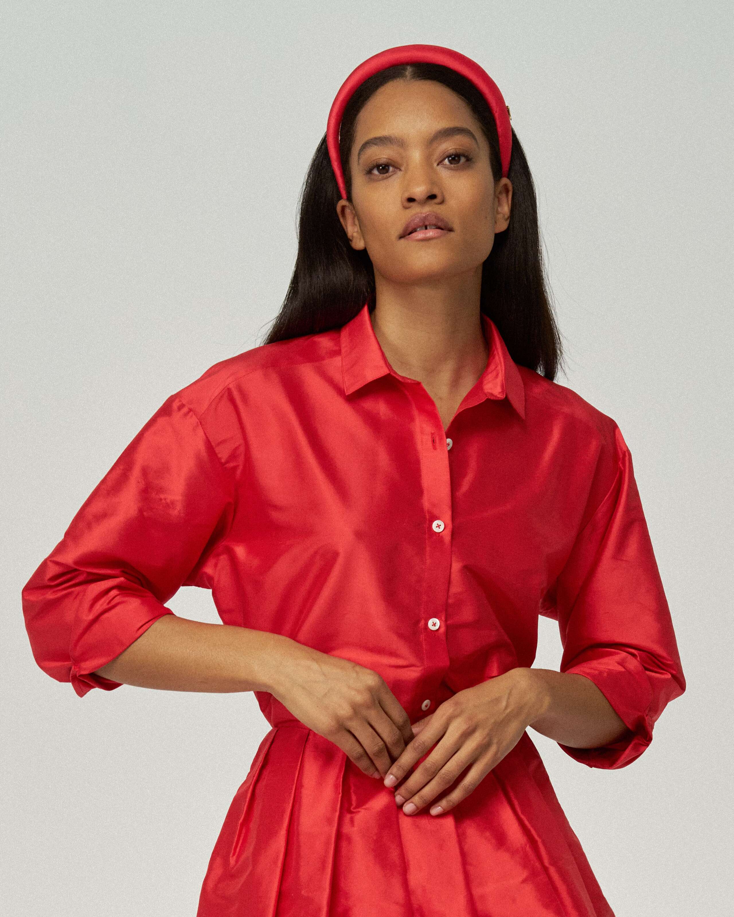 Model wearing the warmest red doupion francesca blouse