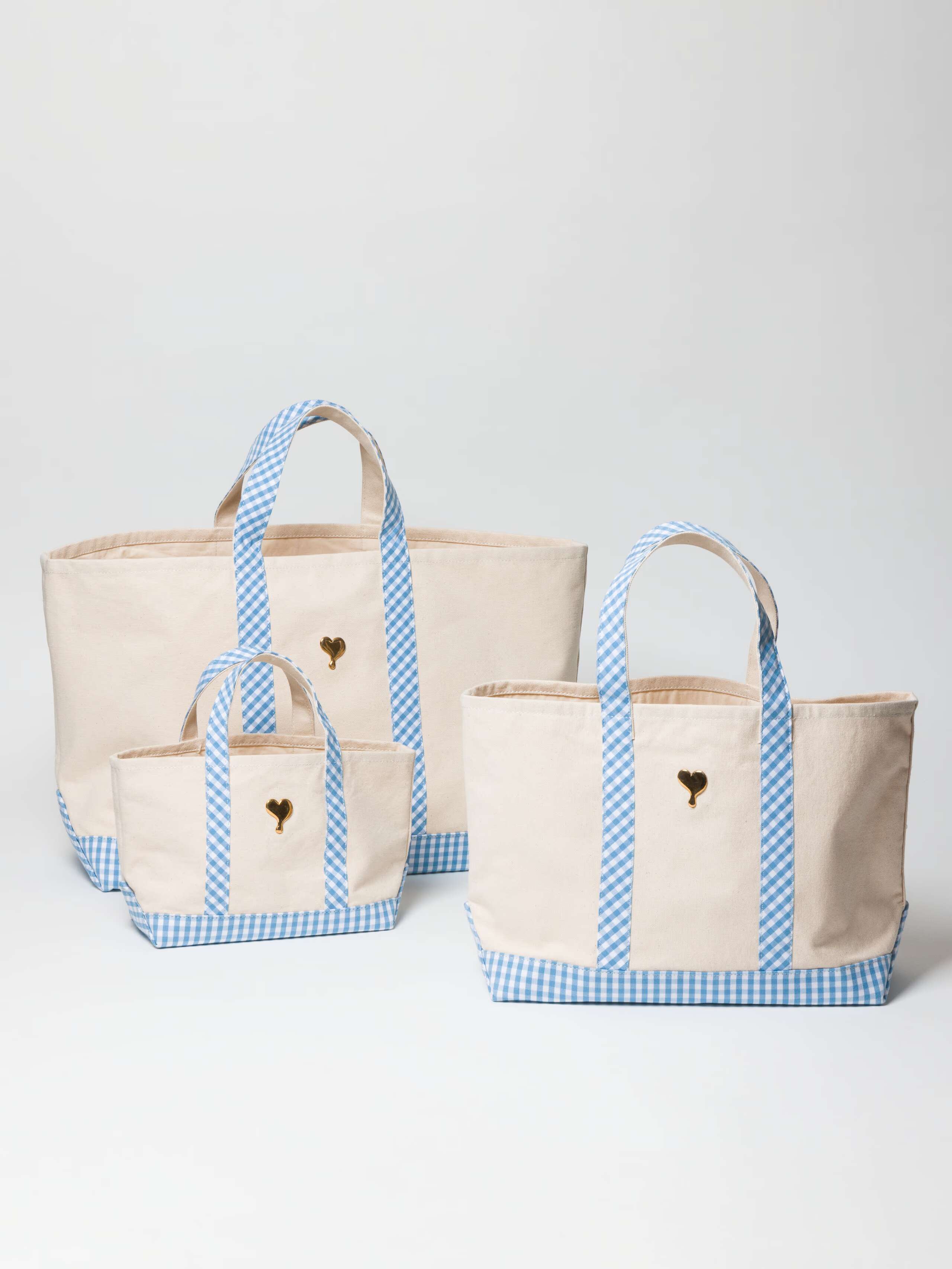 Ferry bag in cotton canvas with vichy check details in three sizes front with brass heart