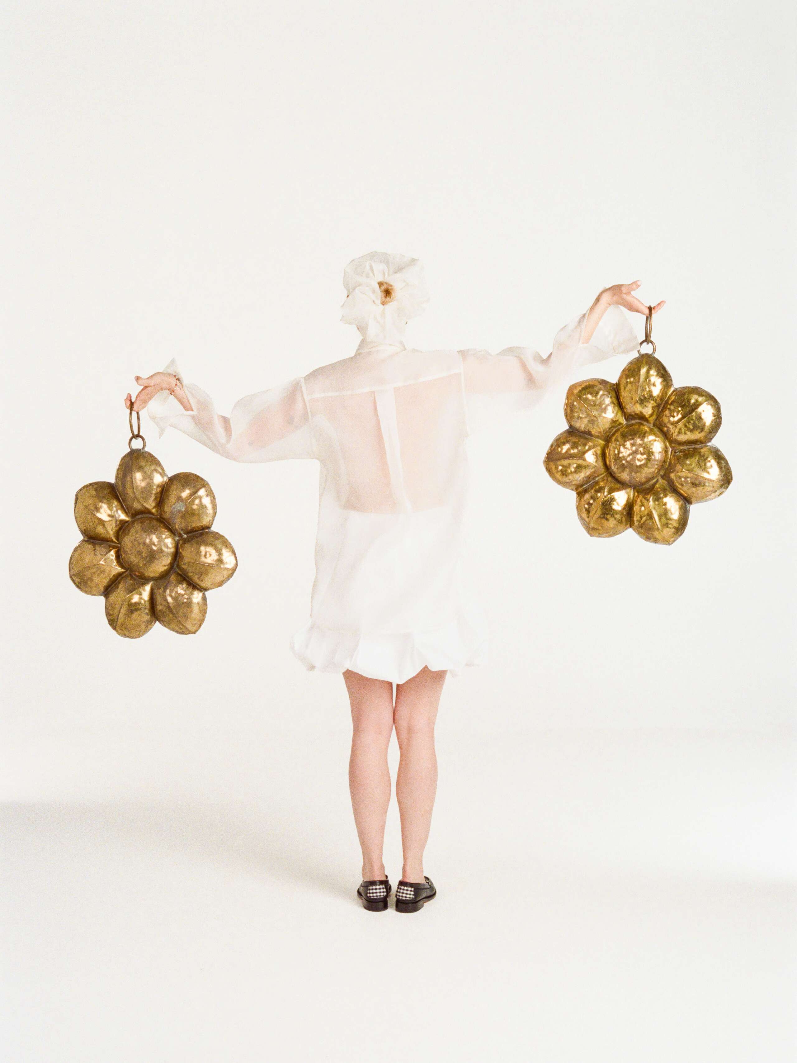 Lola blouse in white sheer organza silk paired with mini white balloon skirt