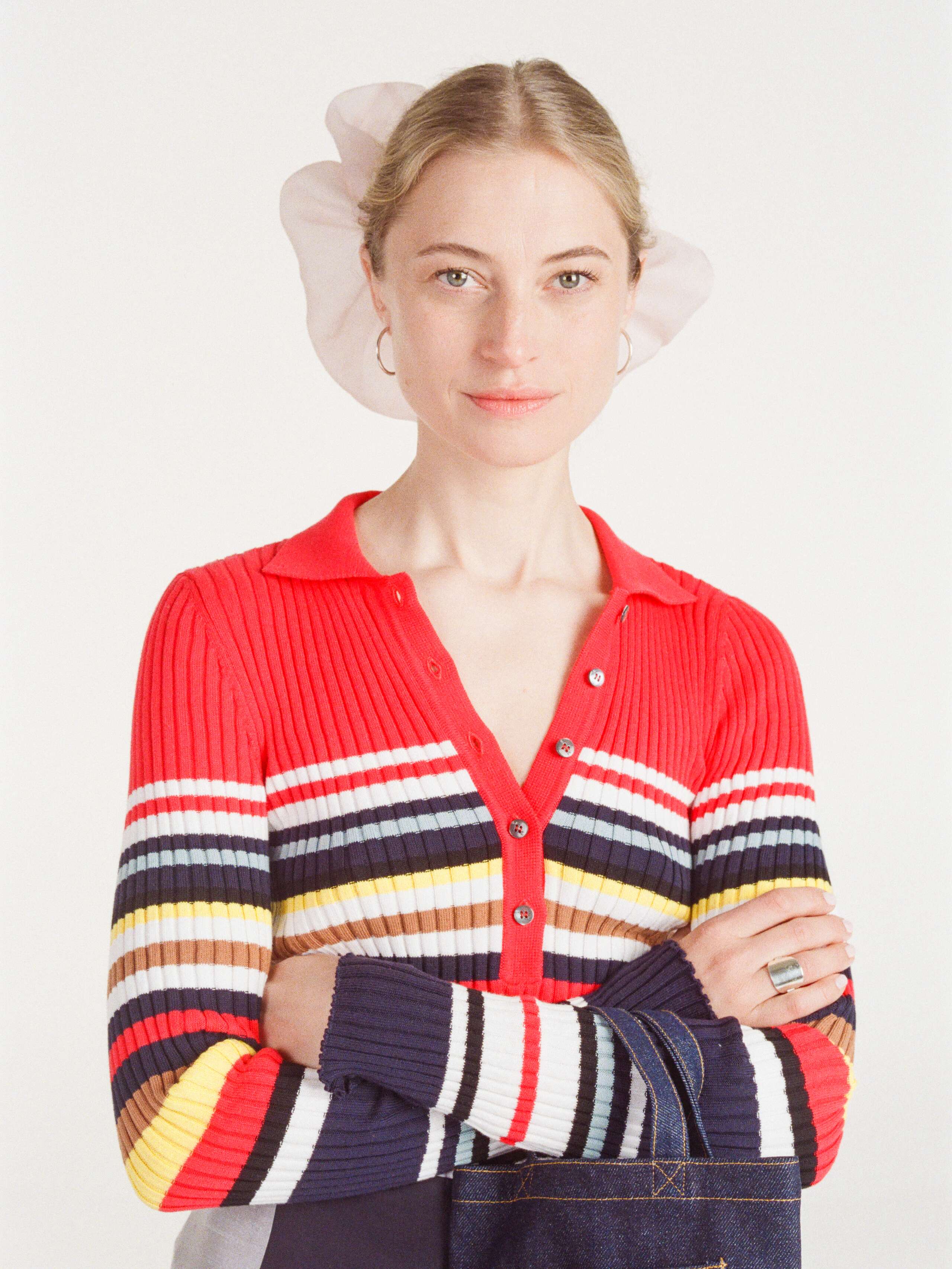 Anna wearing the Venetia striped multi colour Poloshirt in knitted cotton