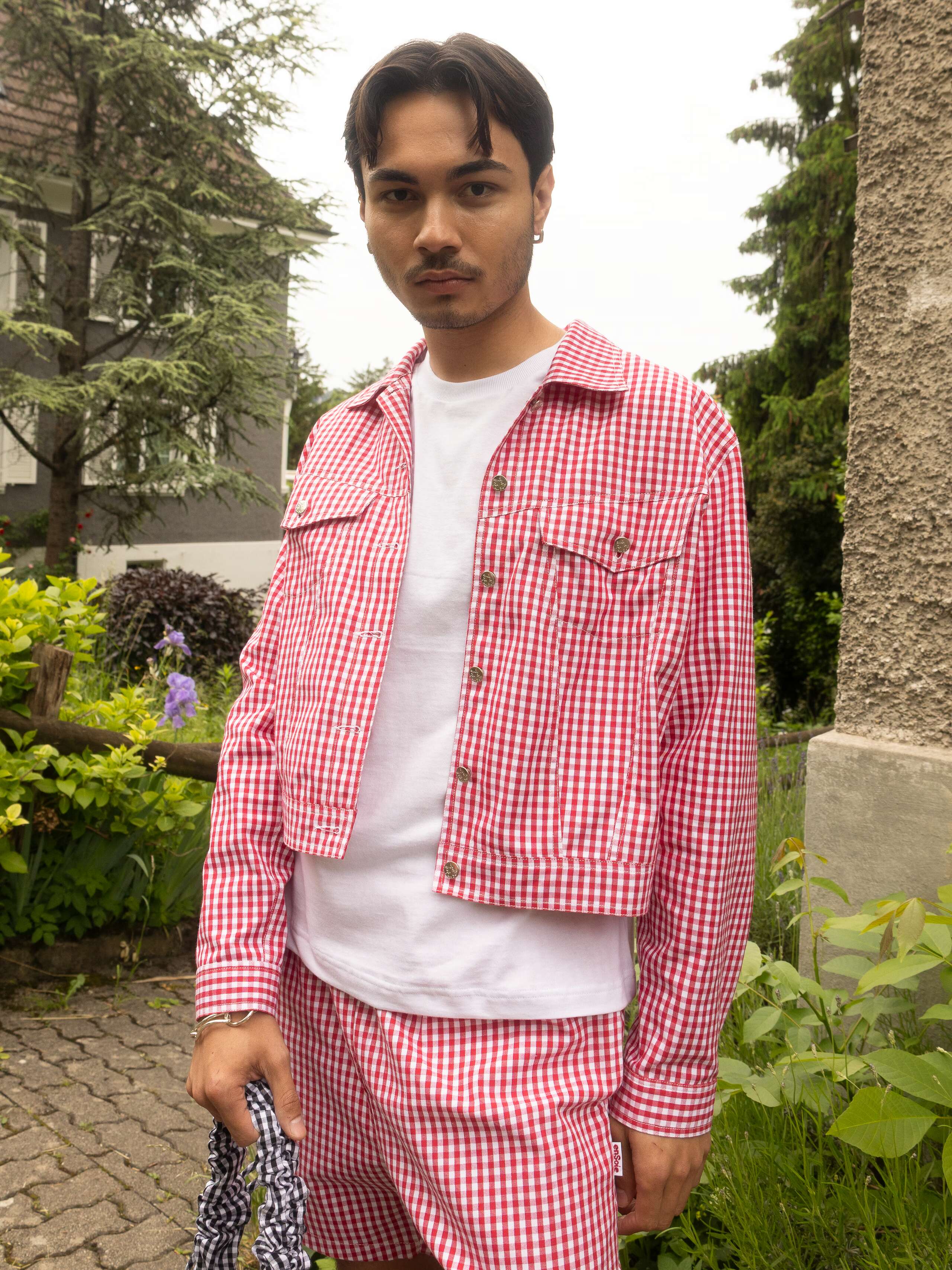 Picture of a man wearing red vichy check 