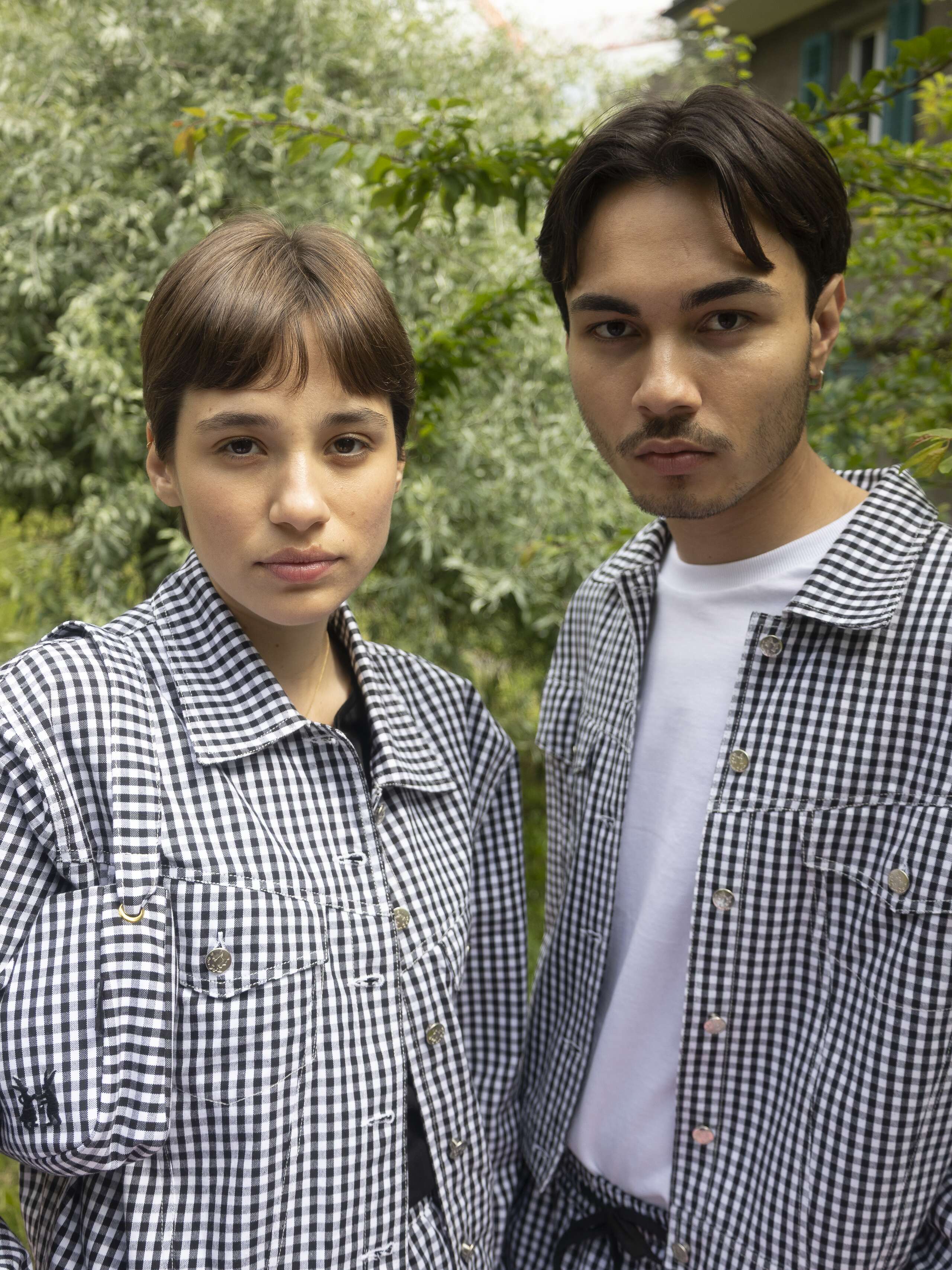 Picture of a man and a women wearing vichy check garments and accessories