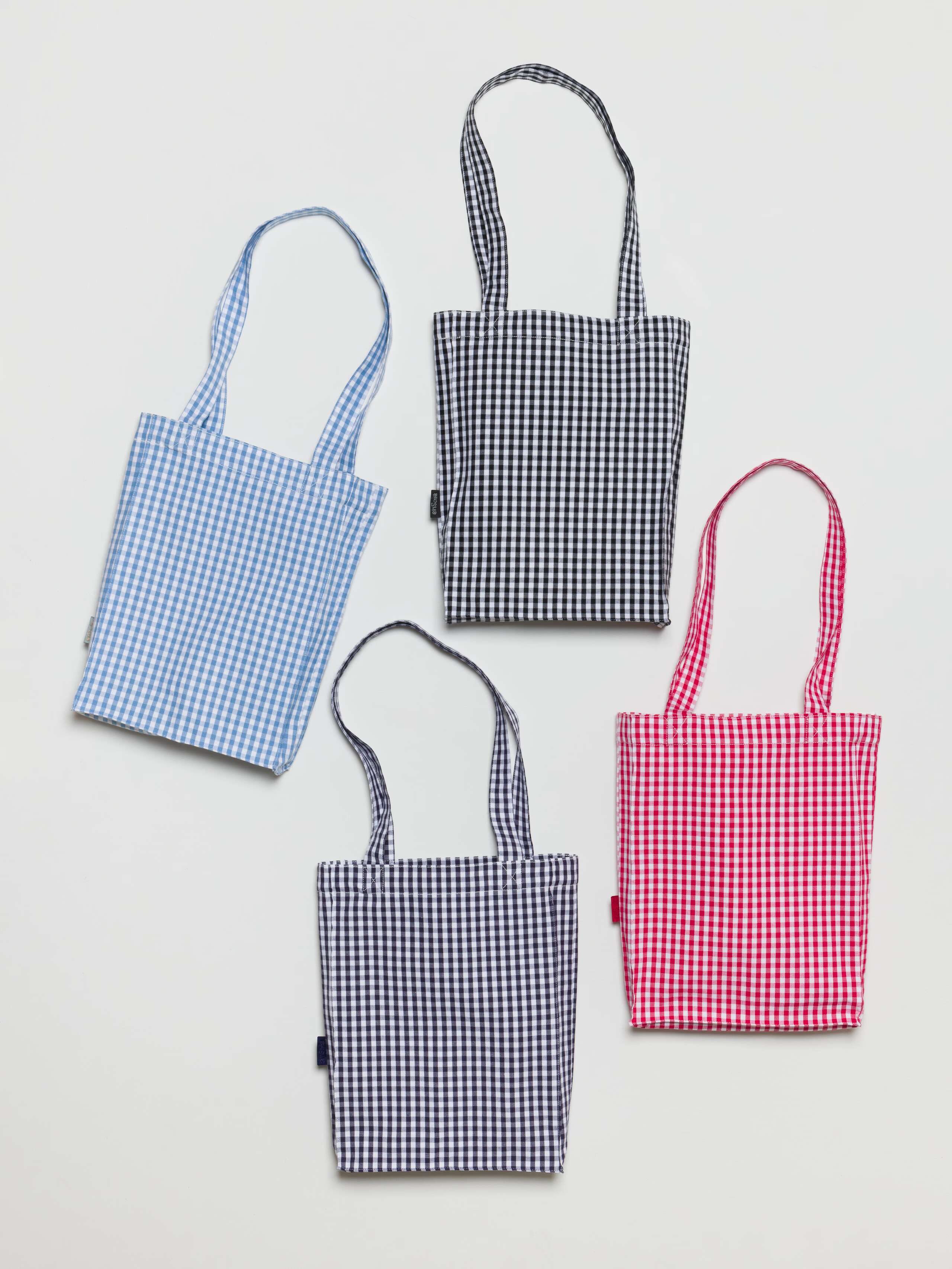 Carry less bag in four colour variations