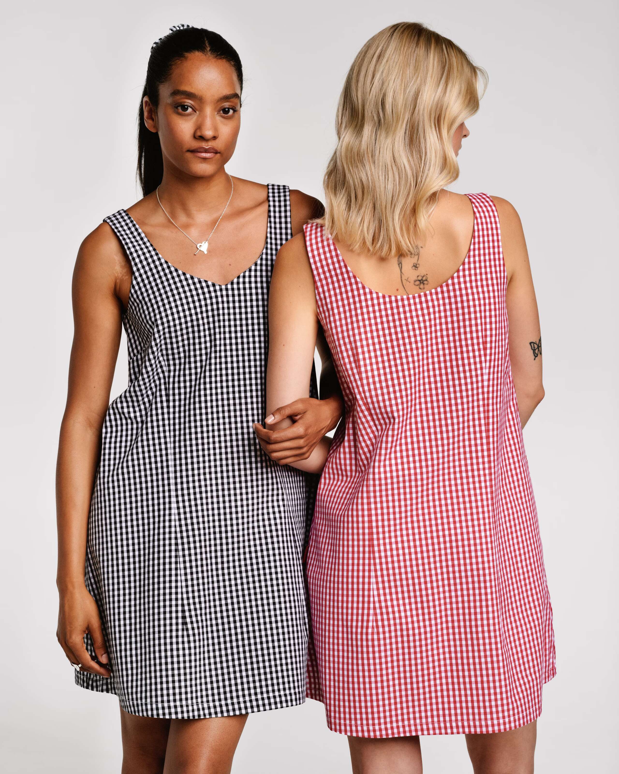 Vichy check dress in black and red with two models