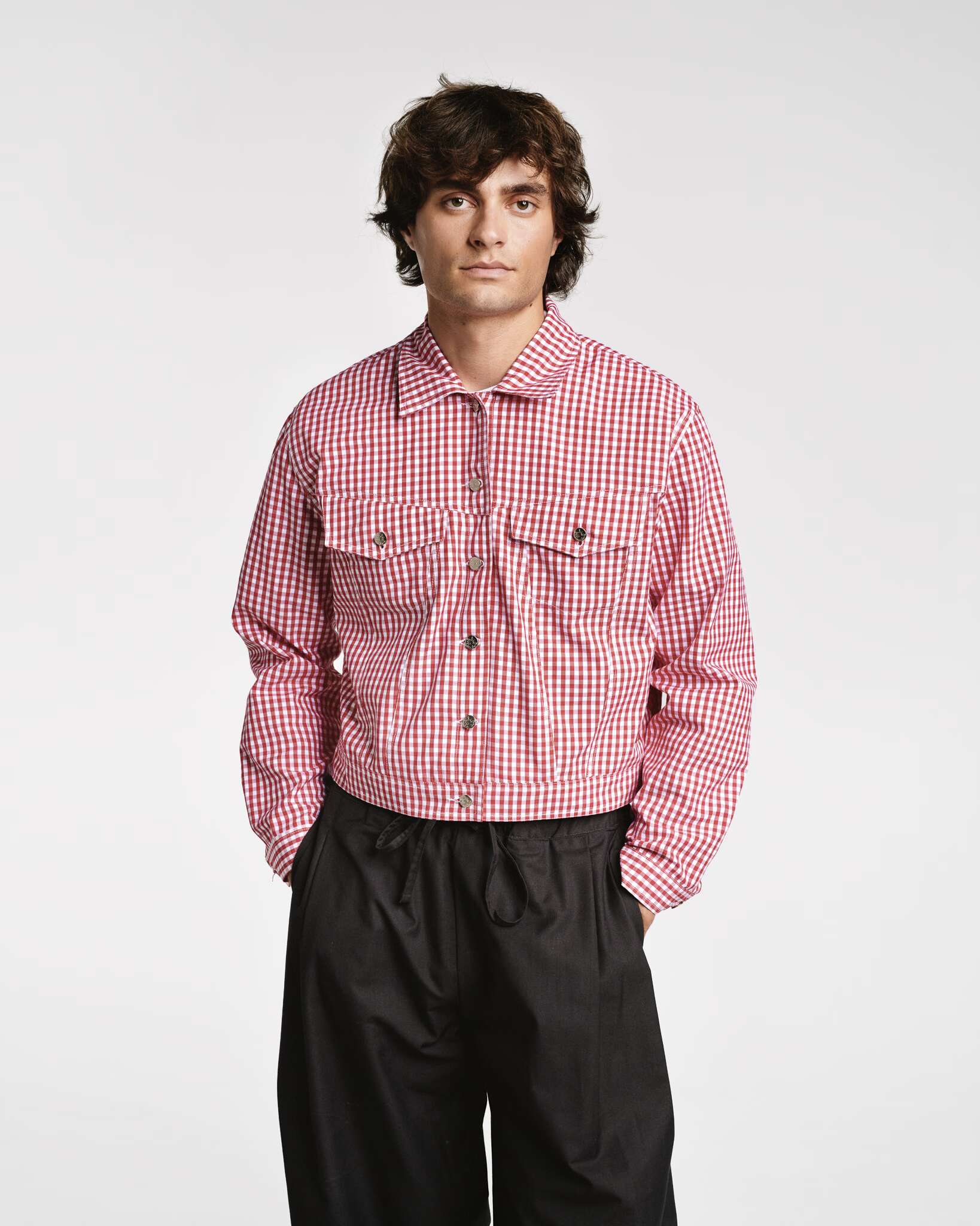 Model wearing the red vichy check Jill jacket