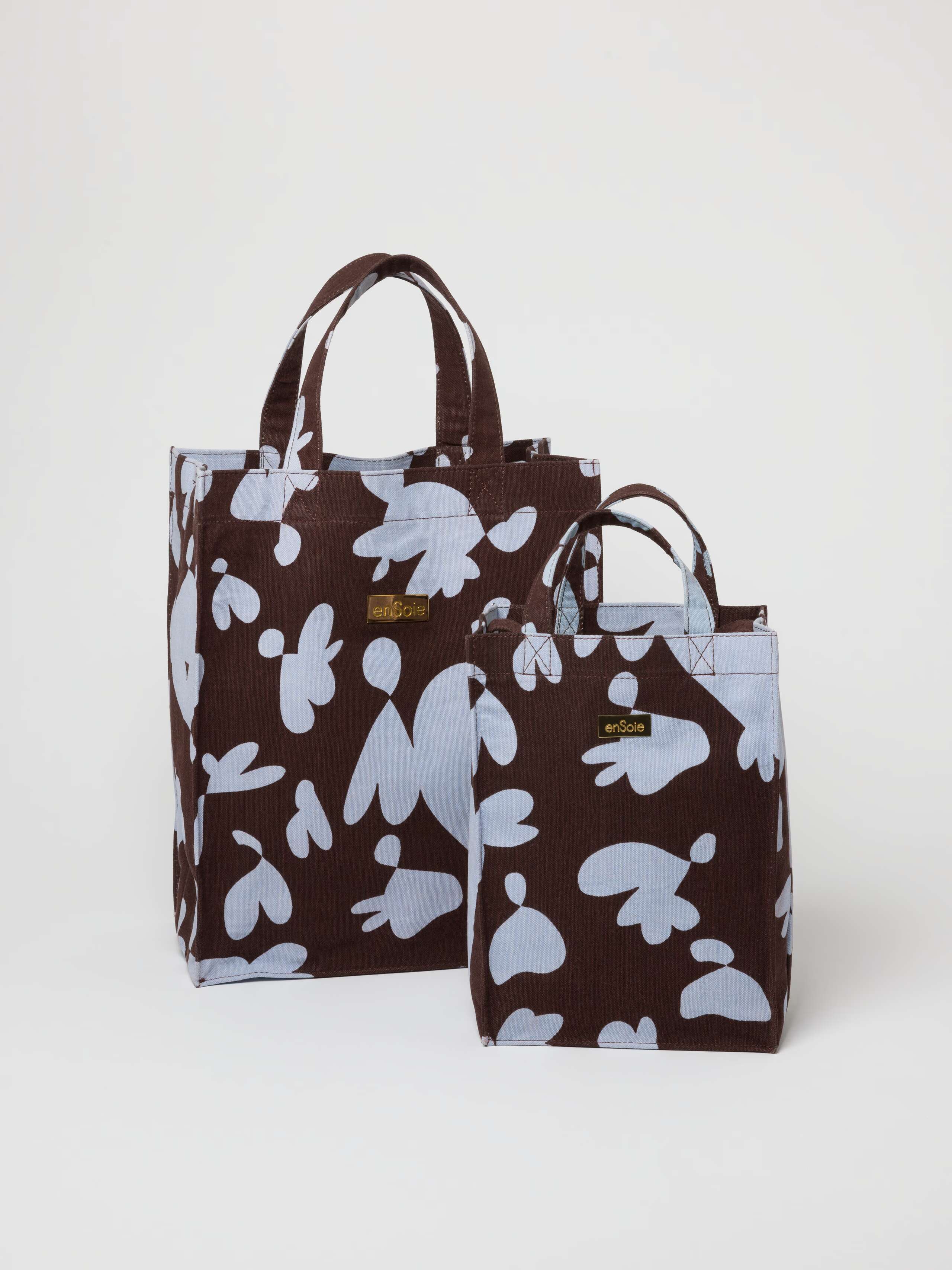 Picture of two canvas bags in brown and light blue shades