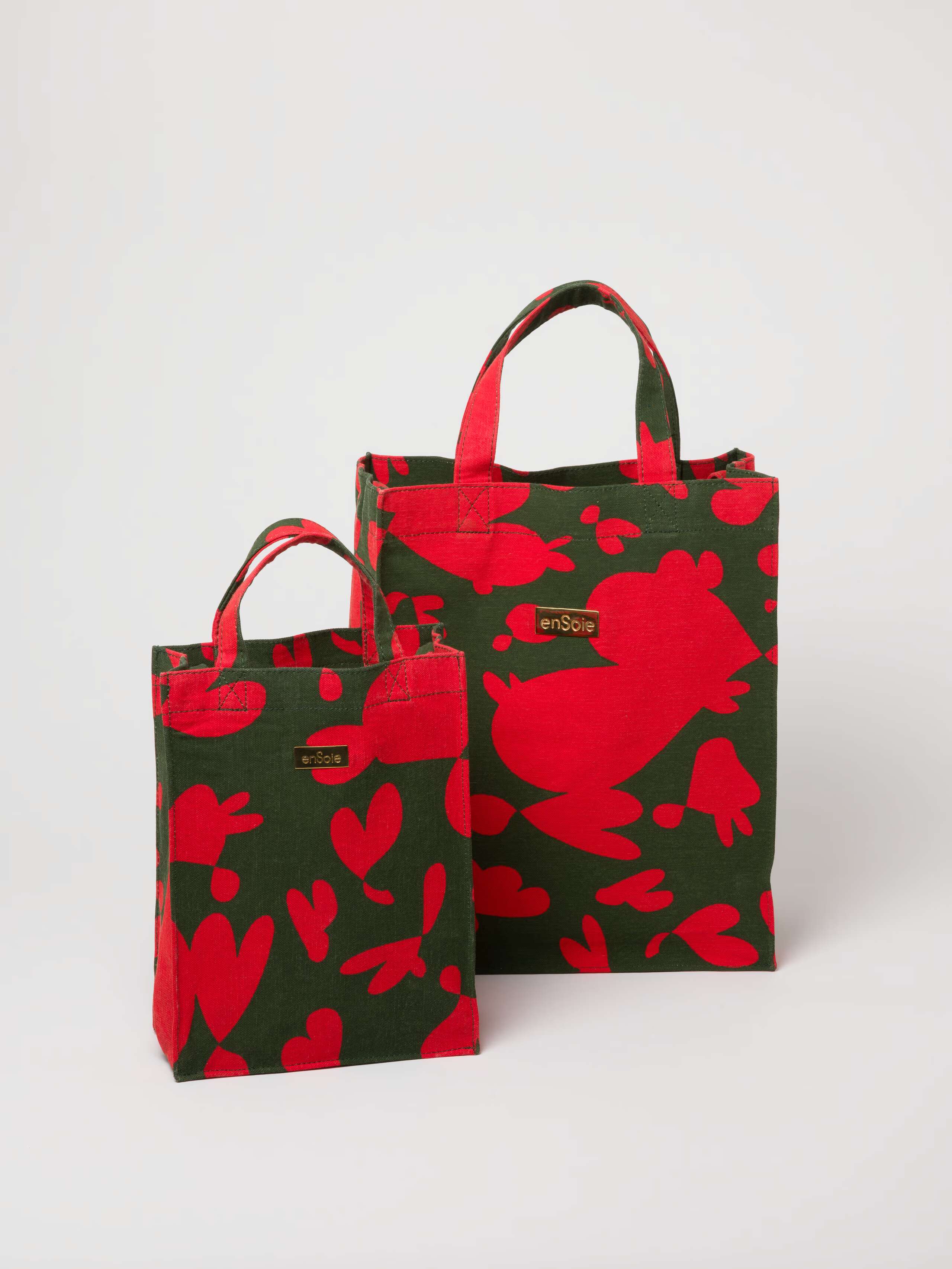 Picture of two canvas bags in red and khaki shades