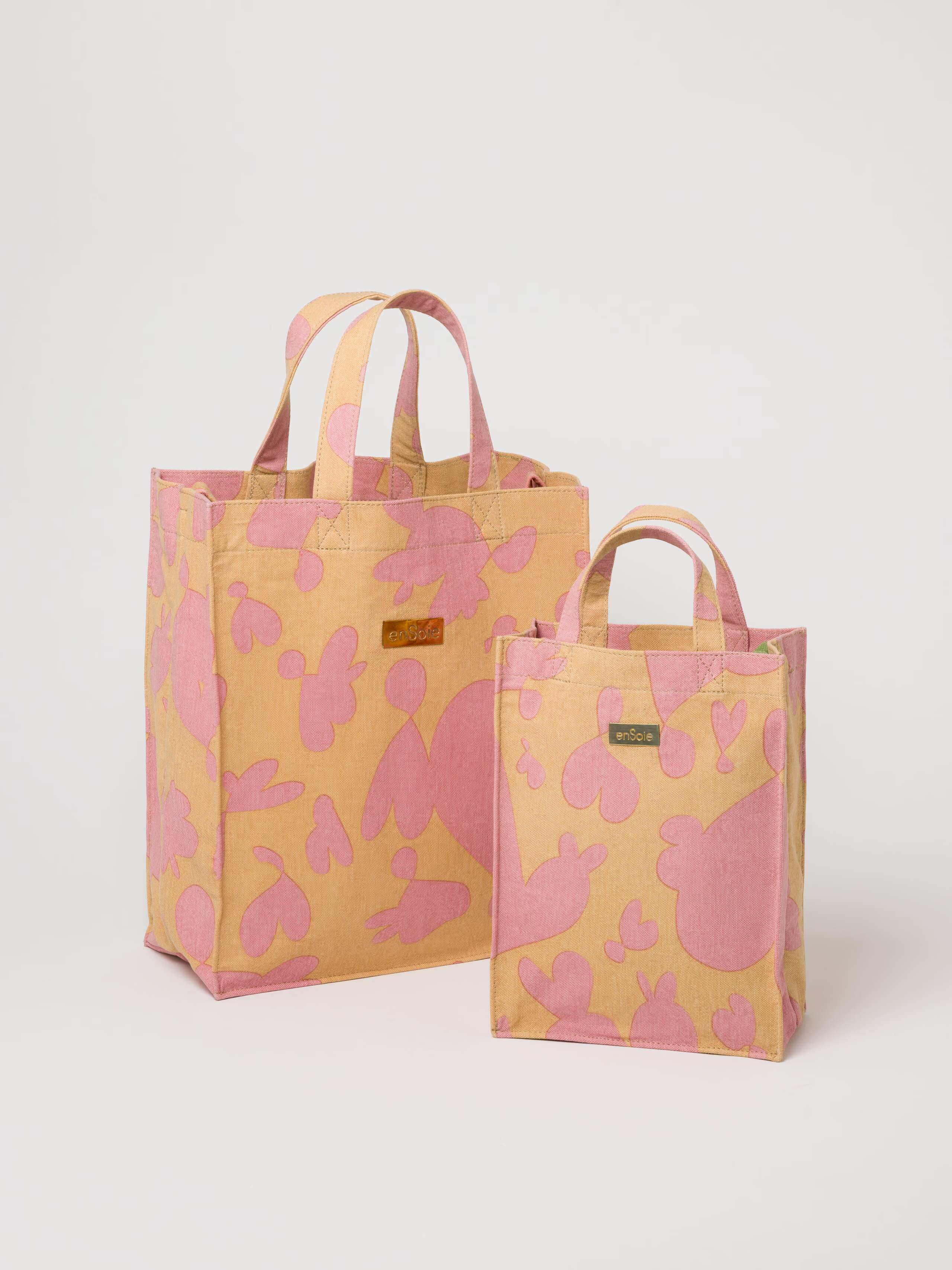 Picture of two canvas bags in rose and beige shades
