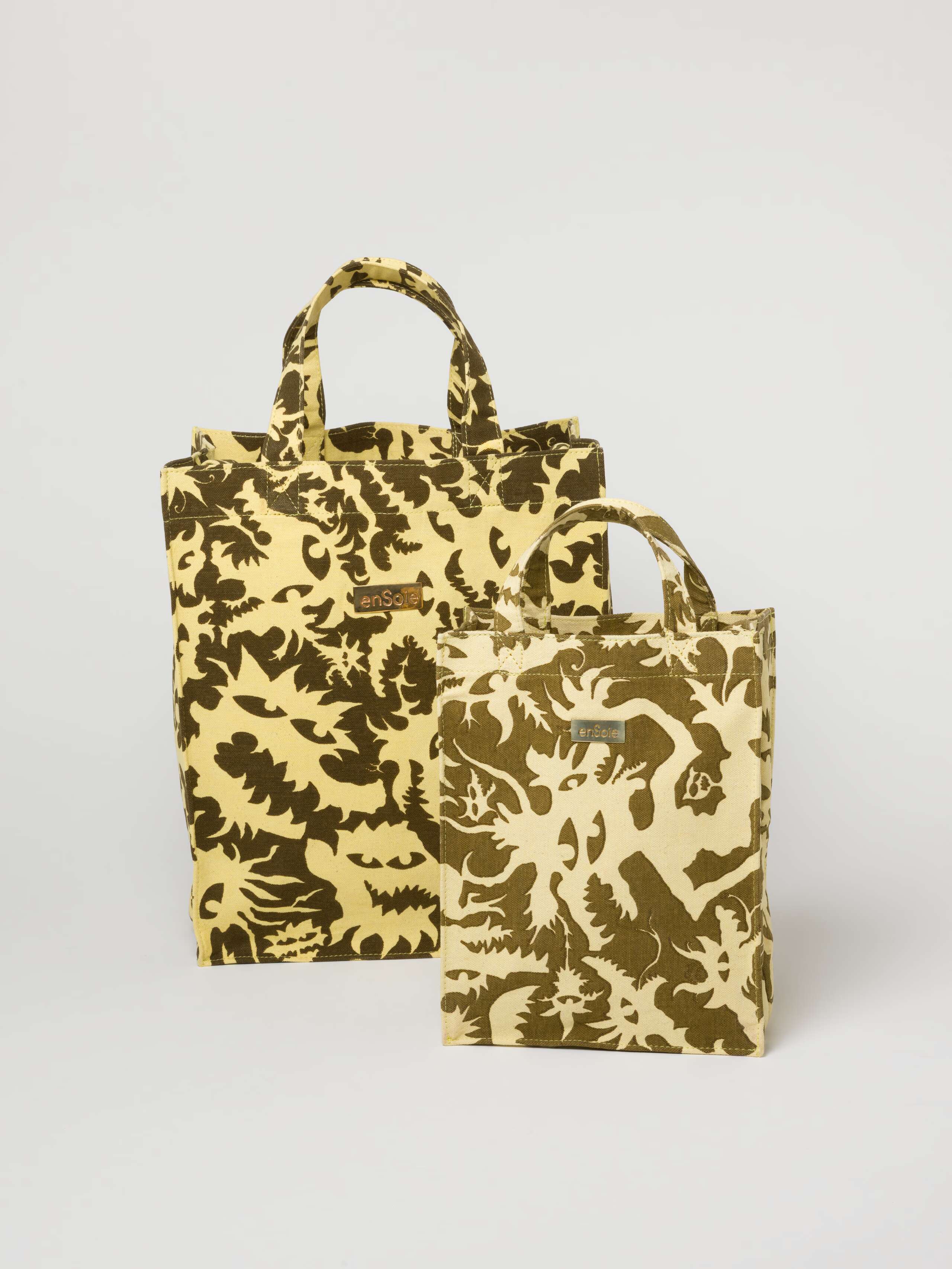 Picture of two canvas bags in olive and beige shades