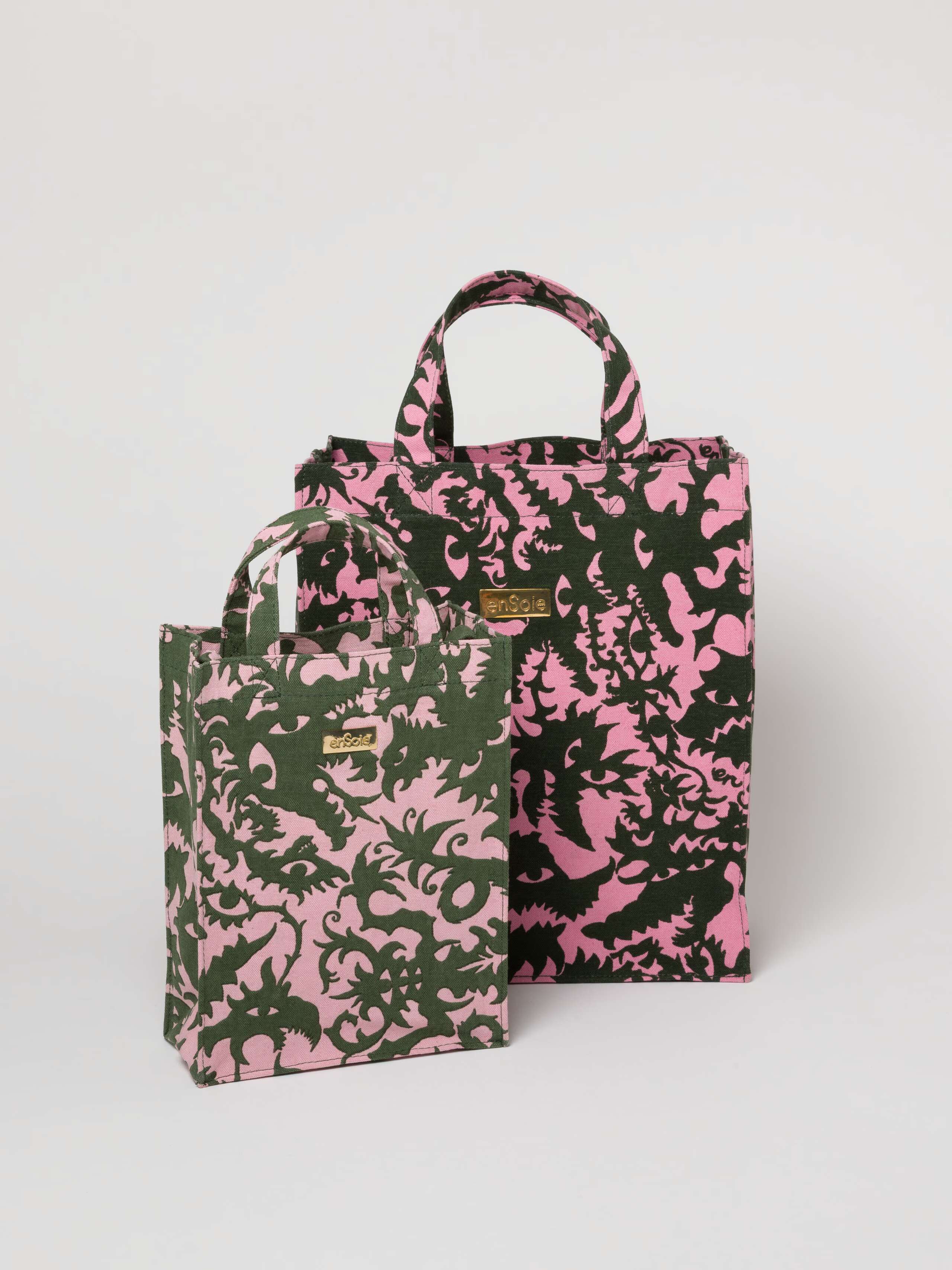 Picture of two canvas bags in khaki and rose shades