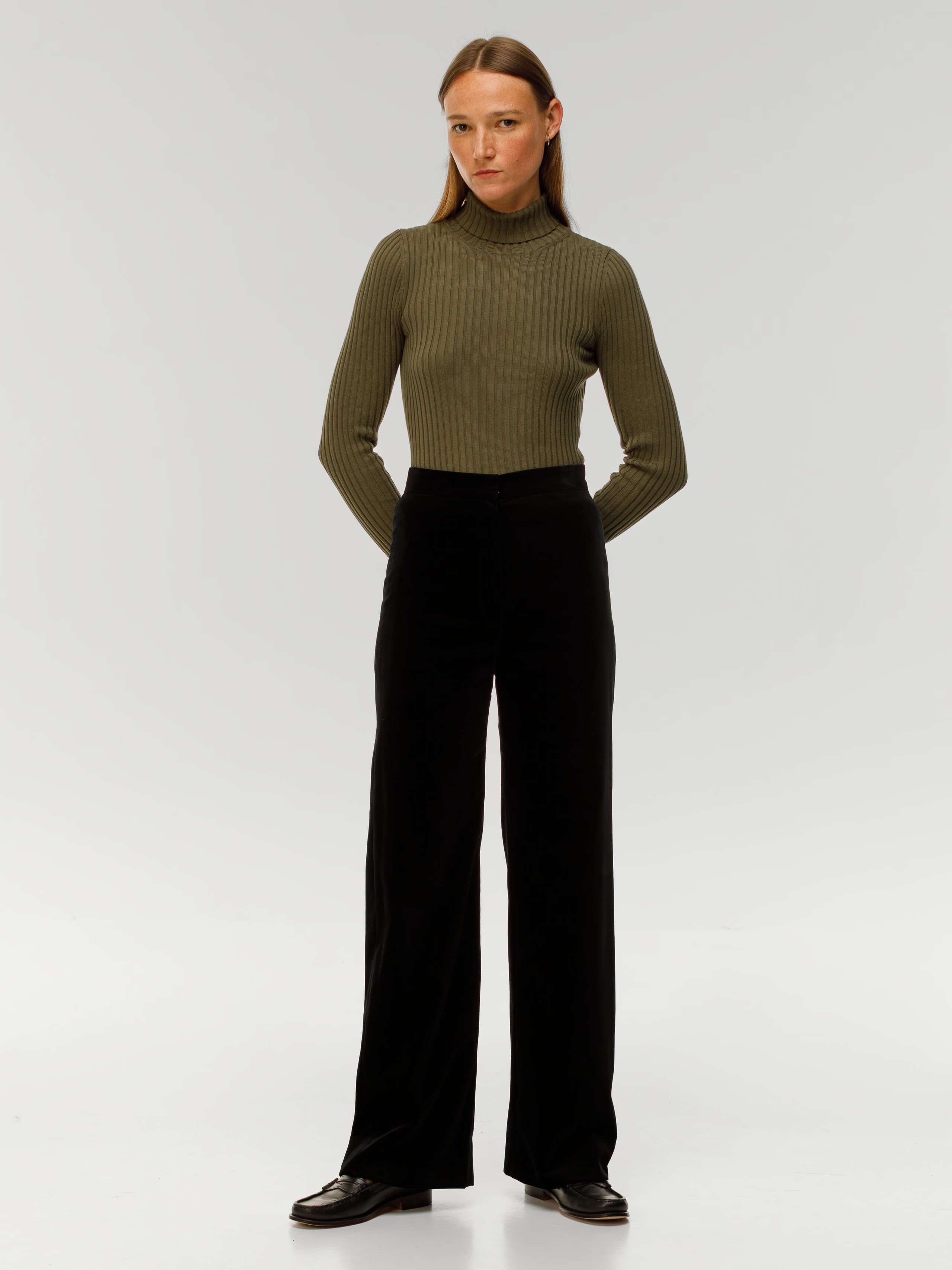 Amy trousers in black cotton velvet worn by model