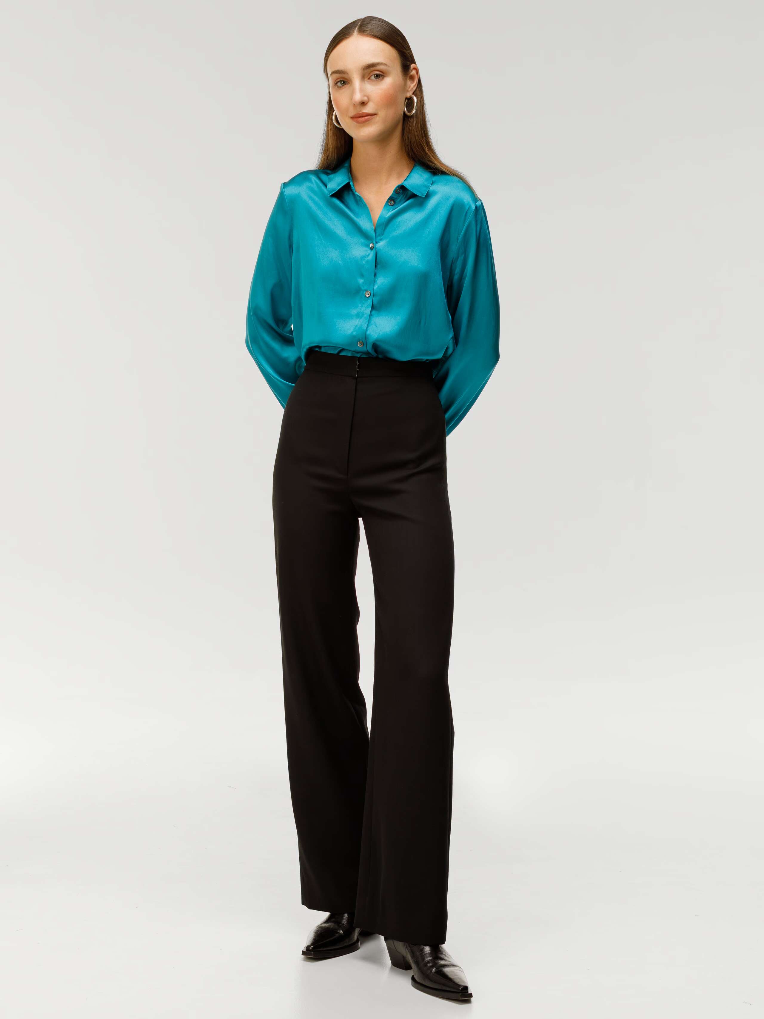 Amy Wool gabardine trousers in black worn by model