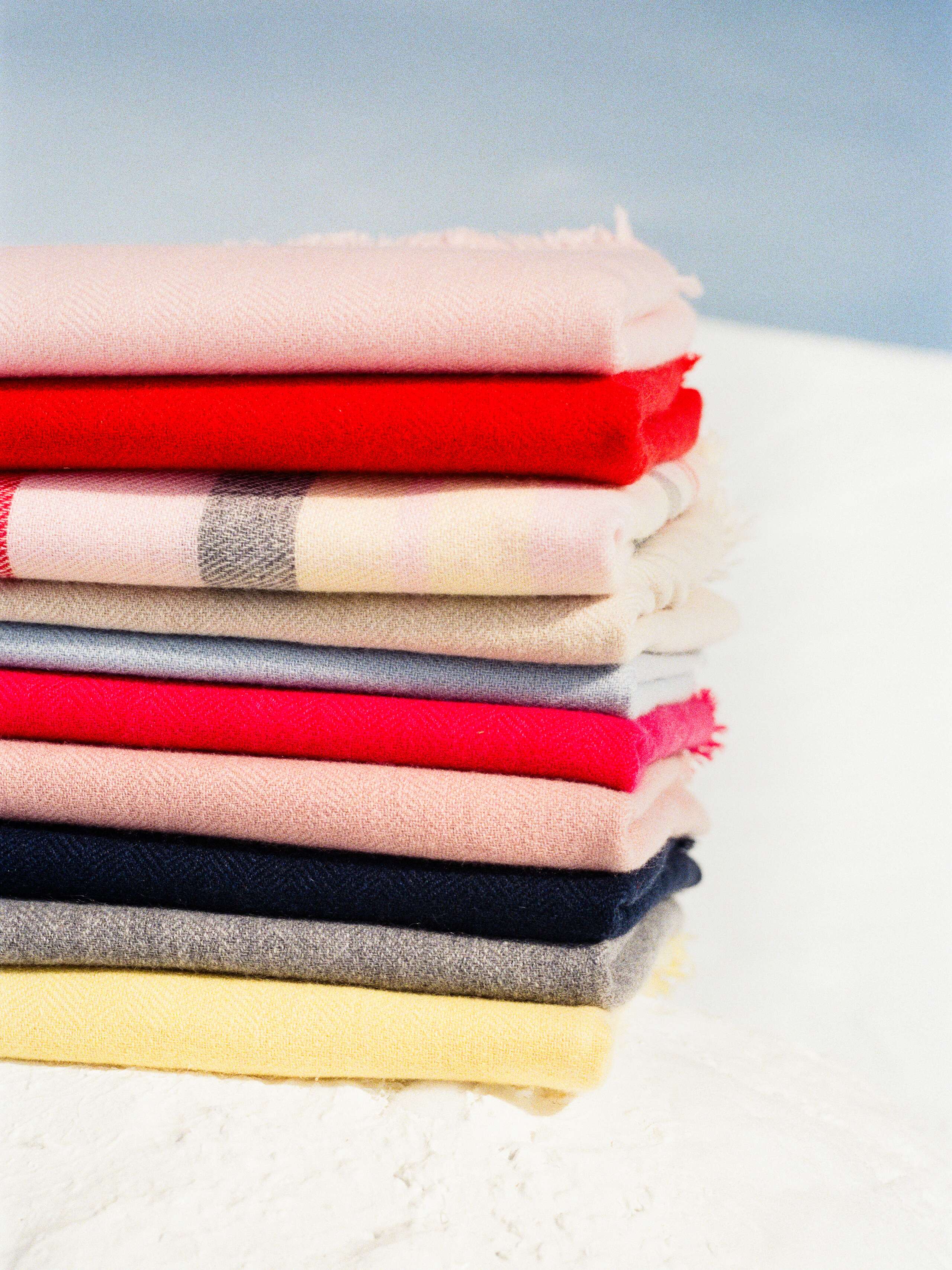 Pciture of a pile of cashmere stoles