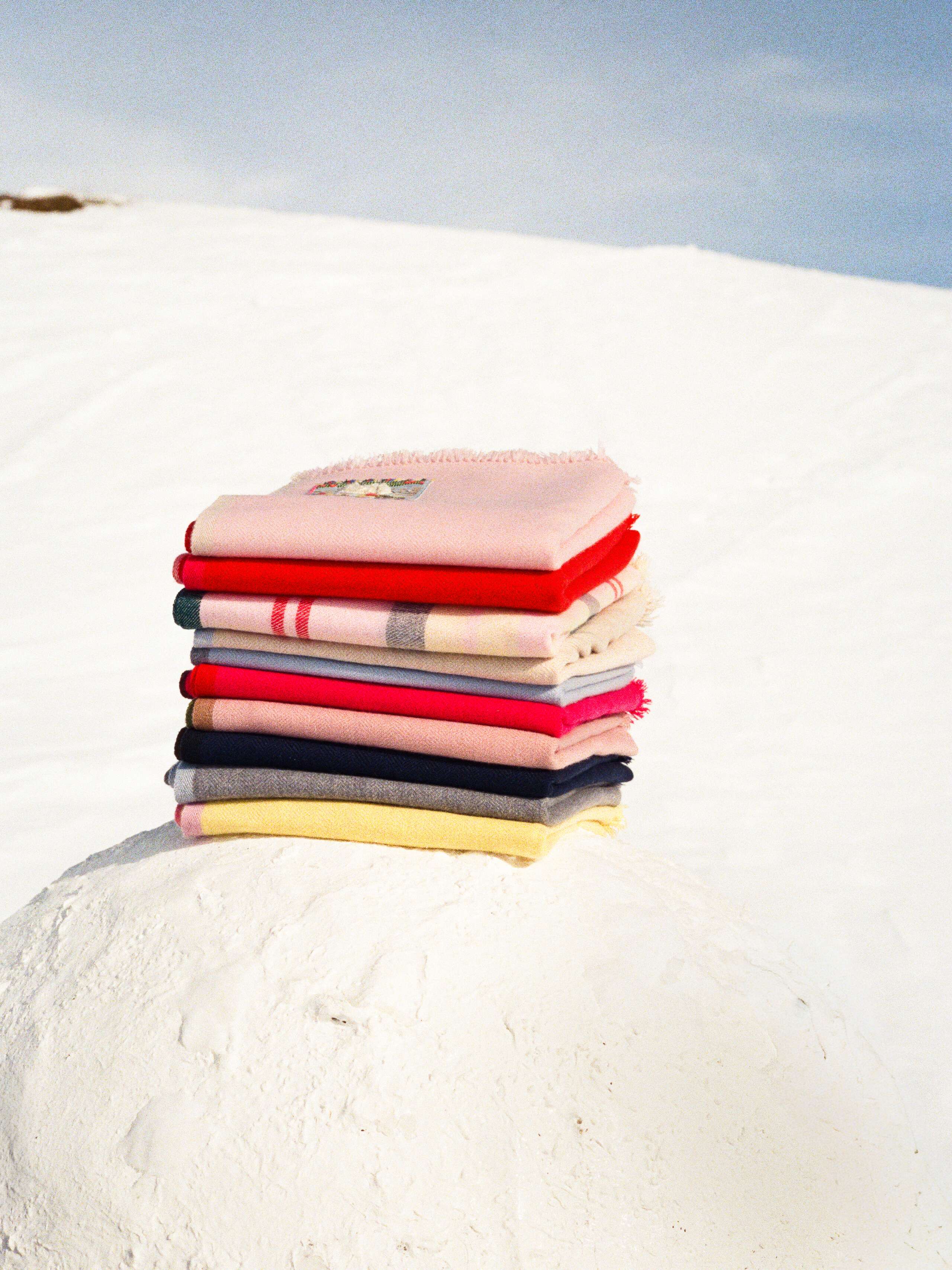 Pciture of a pile of cashmere stoles