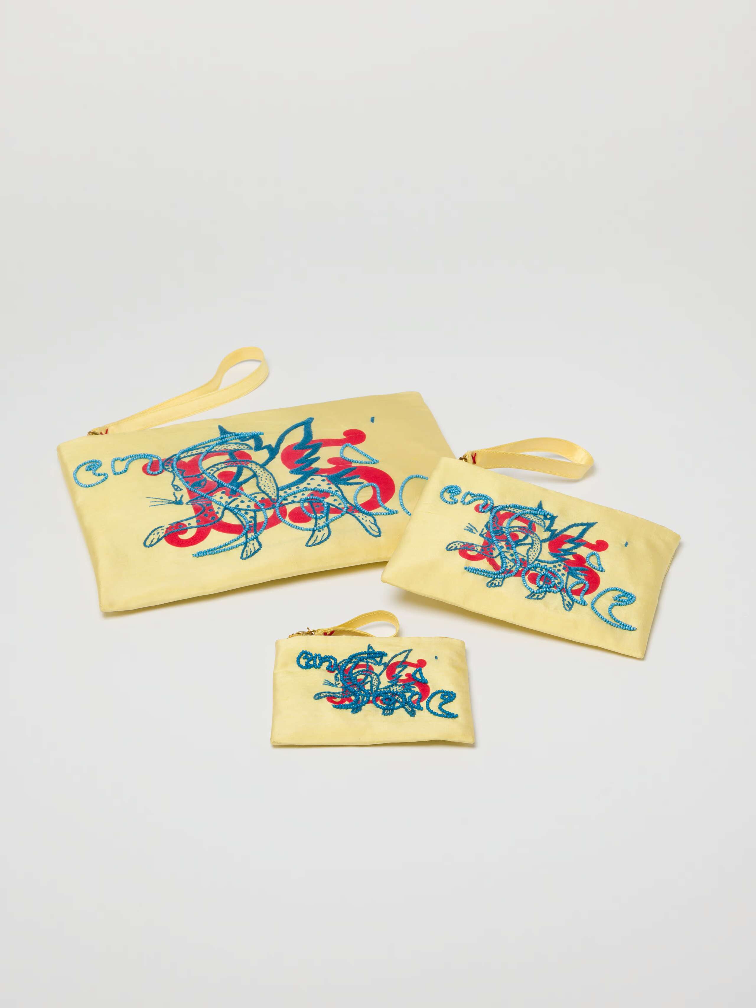 enSoie element pouch in soft yellow, three sizes