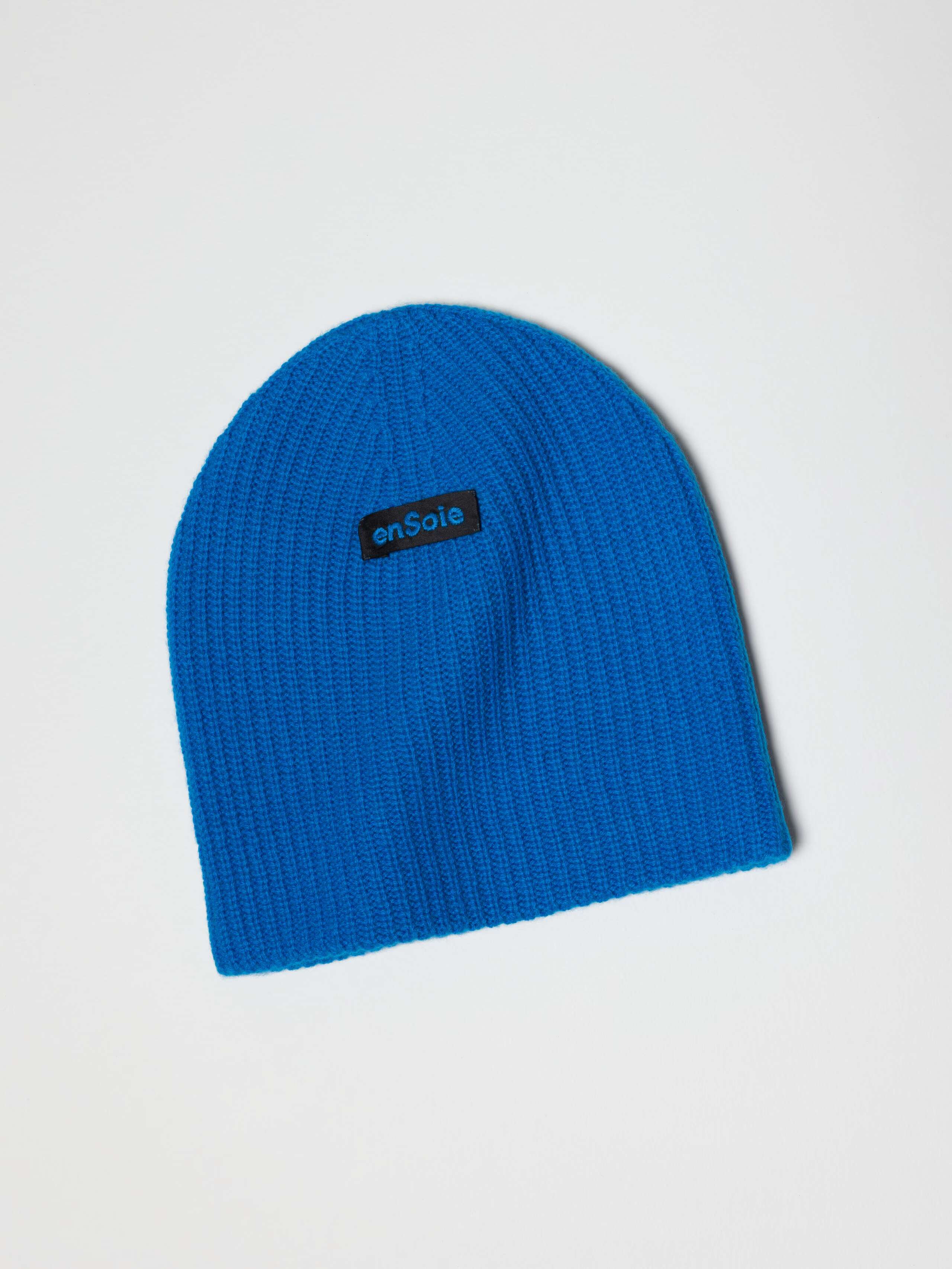 Picture of a blue knitted cashmere hat