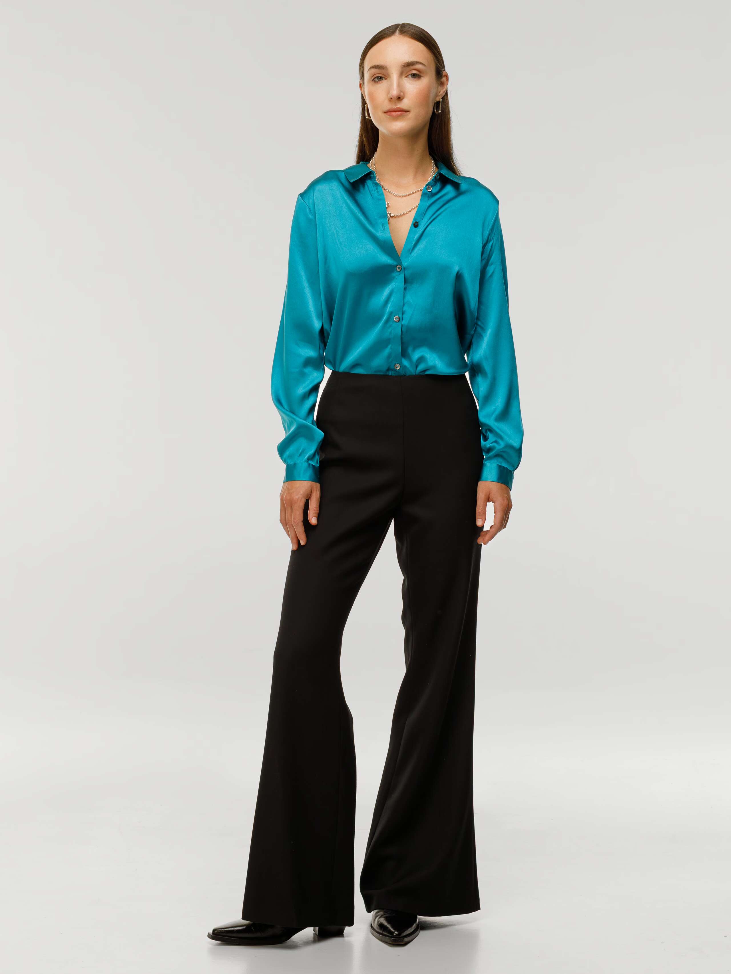 Romy blouse funky blue in doupion silk worn by model