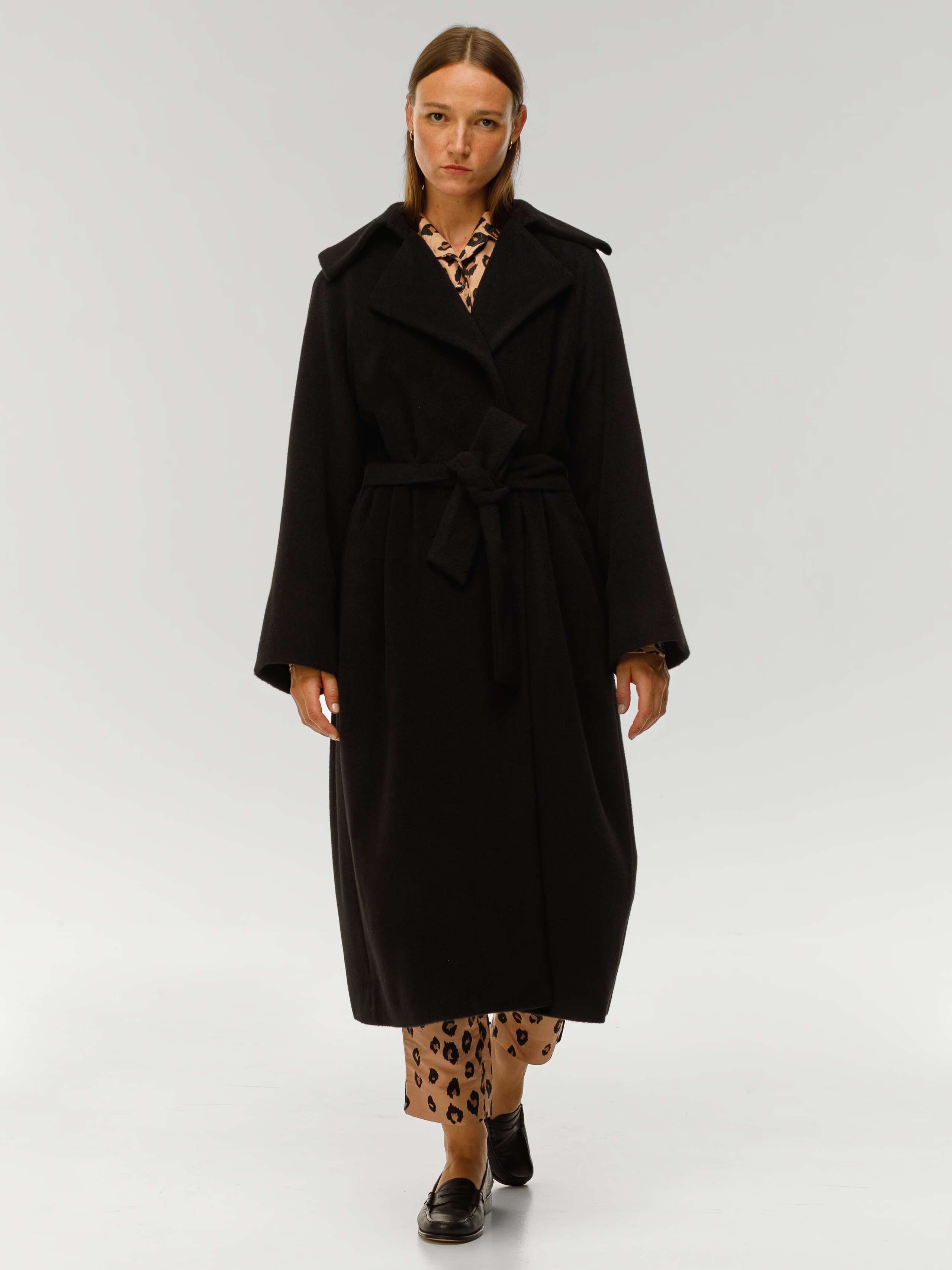 Soho alpaca wool coat in black worn by model
