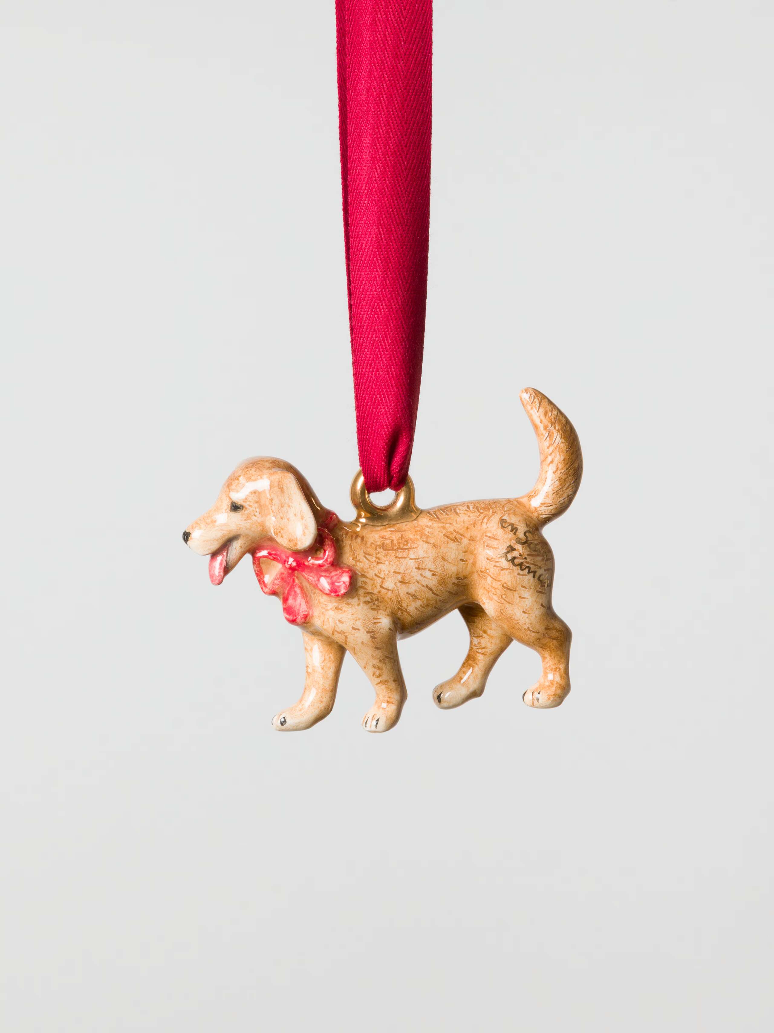 Dog with Bow ceramic ornament