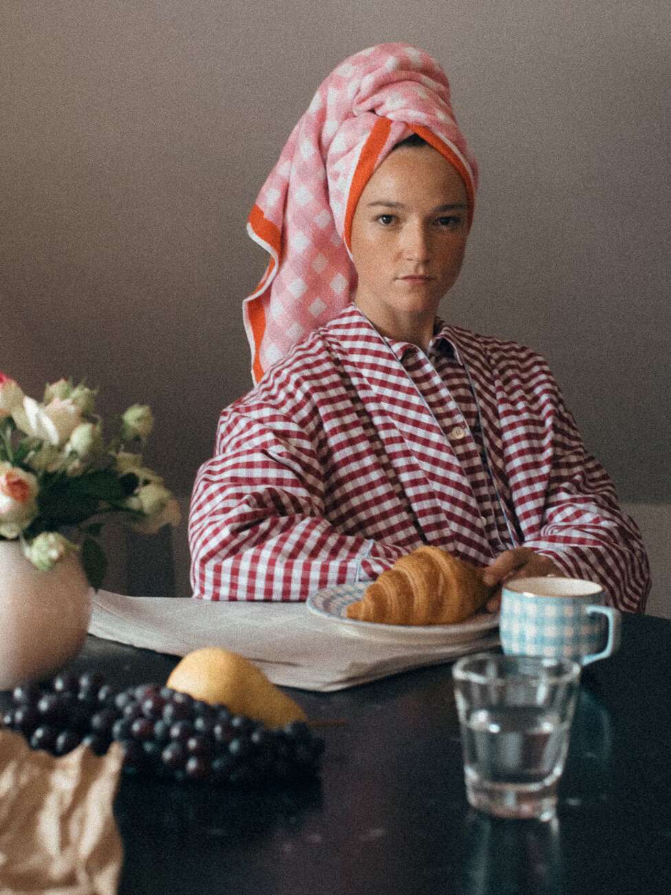 Picture of a women sitting on a breakfast table