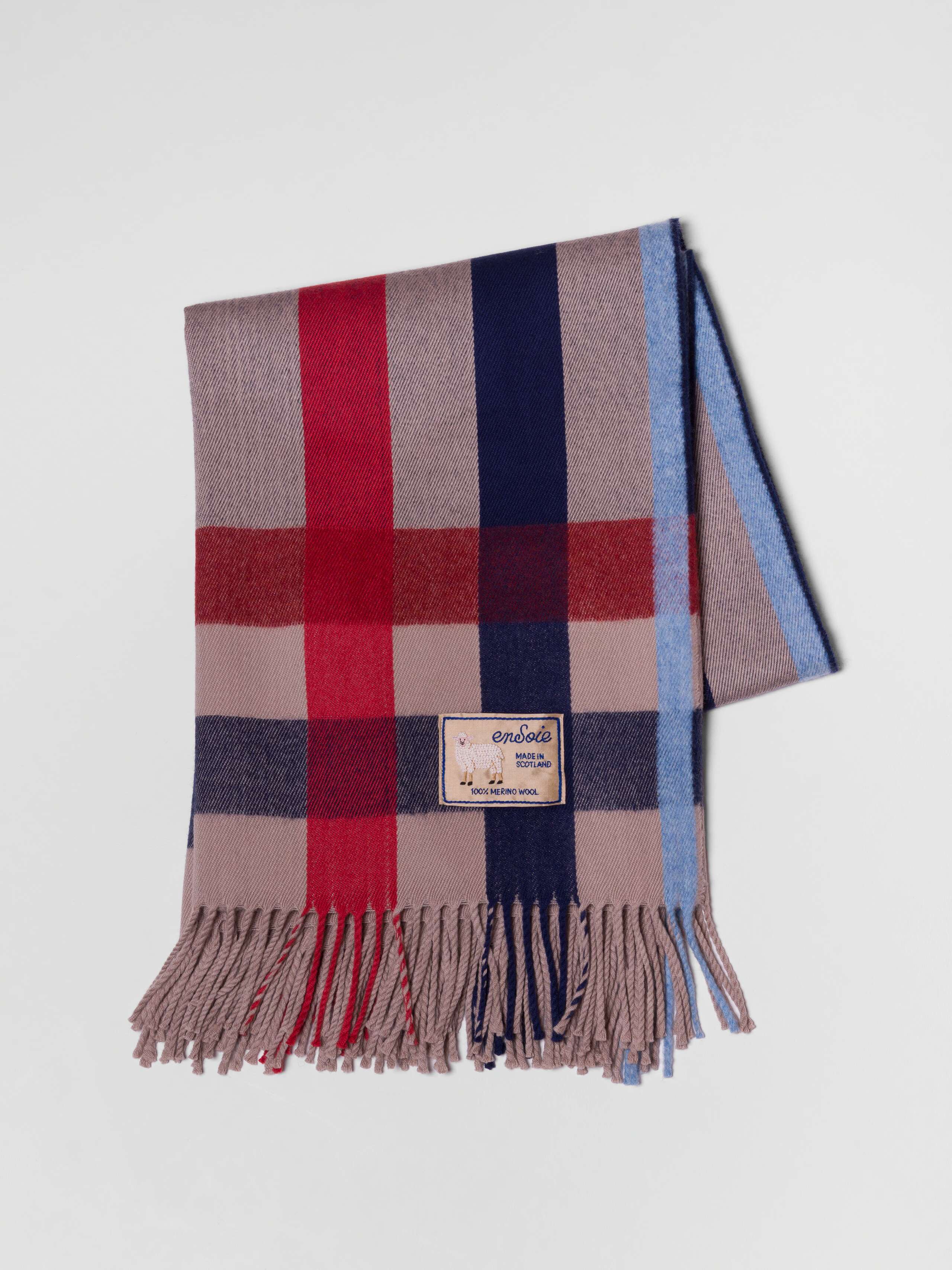 cosy dance james blanket in natural brown wool with check in red and navy blue