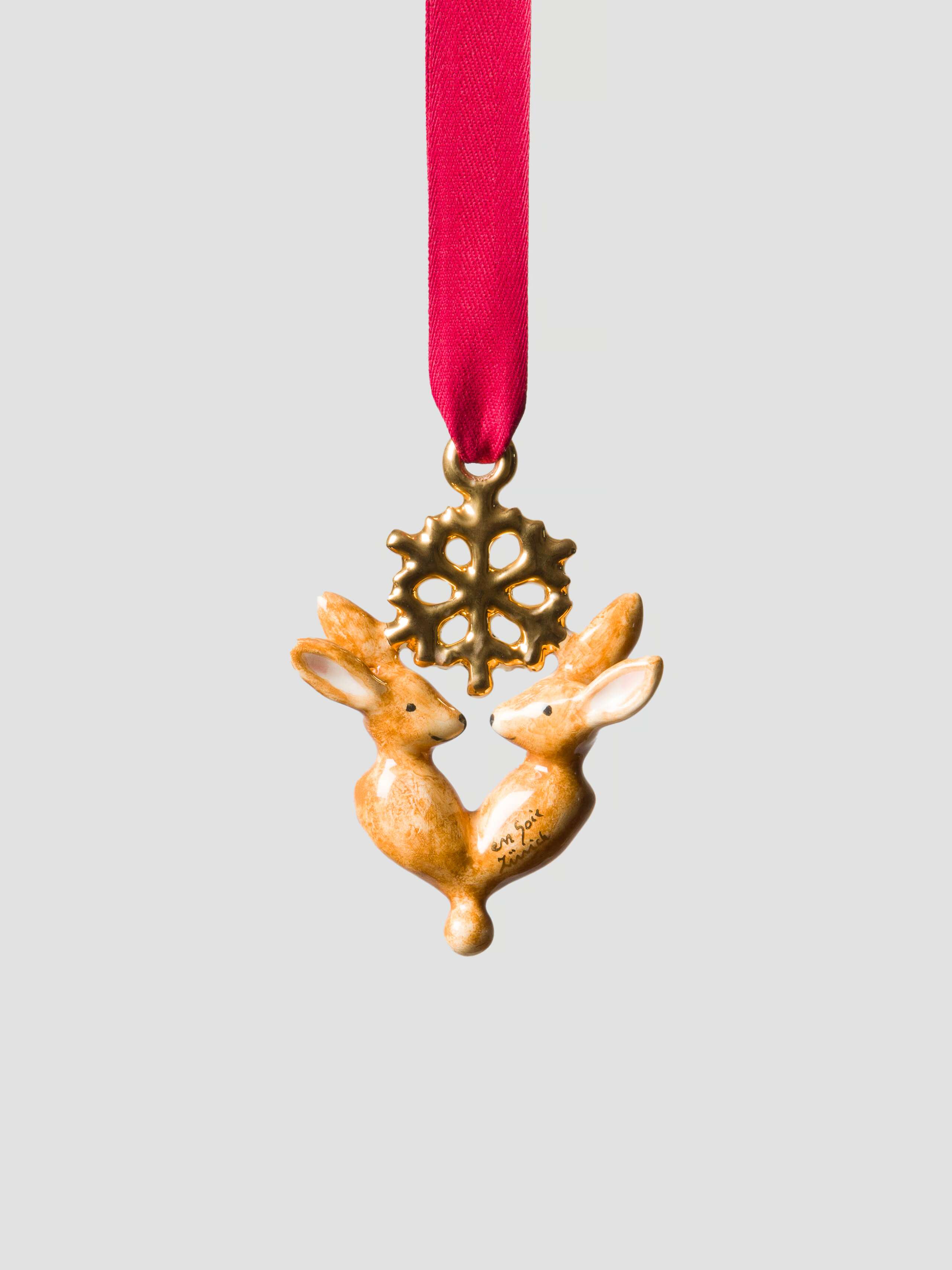 rabbits with snowflake in gold