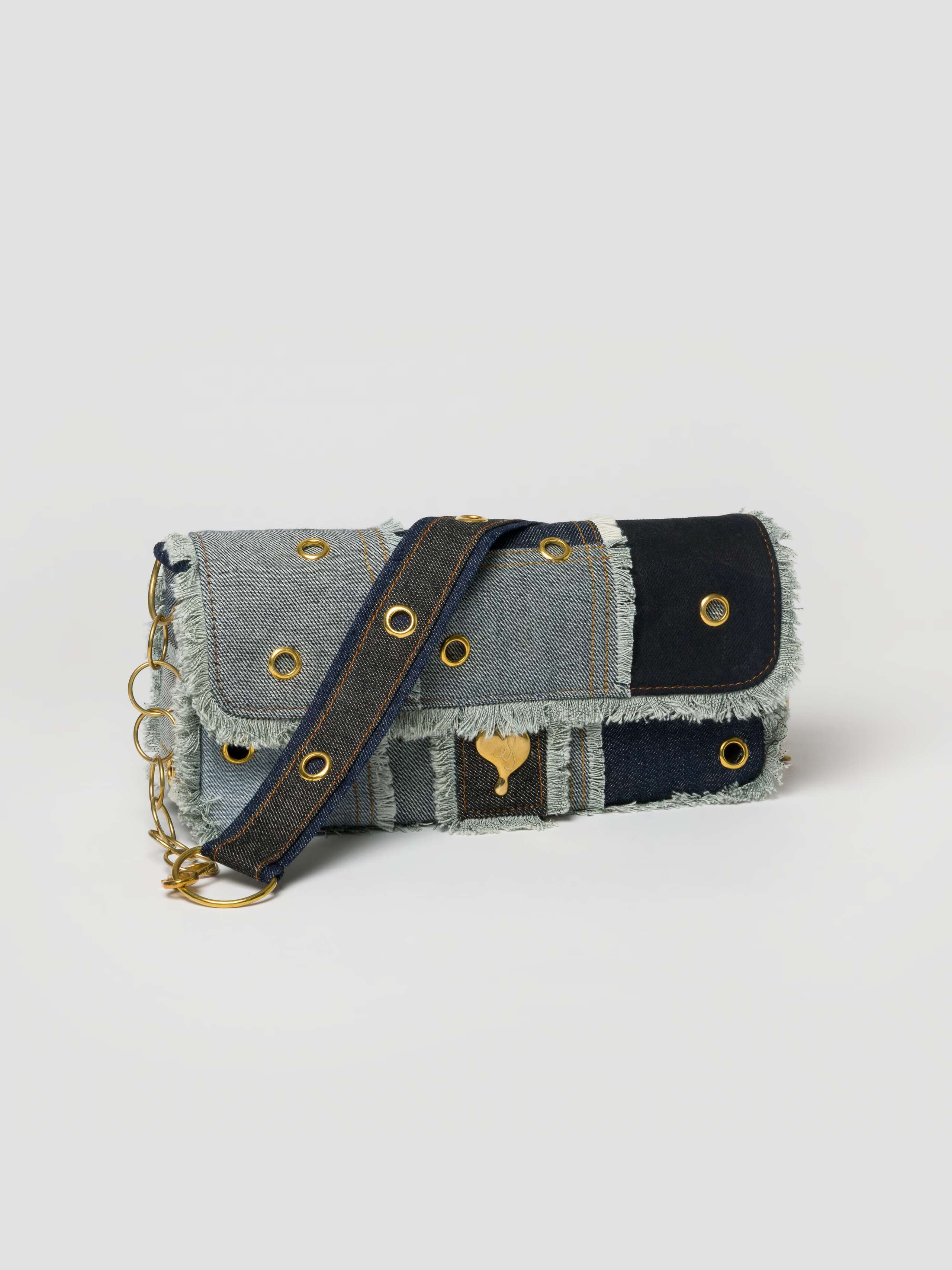 Sheri bag cotton denim with studs in brass and various denim shades