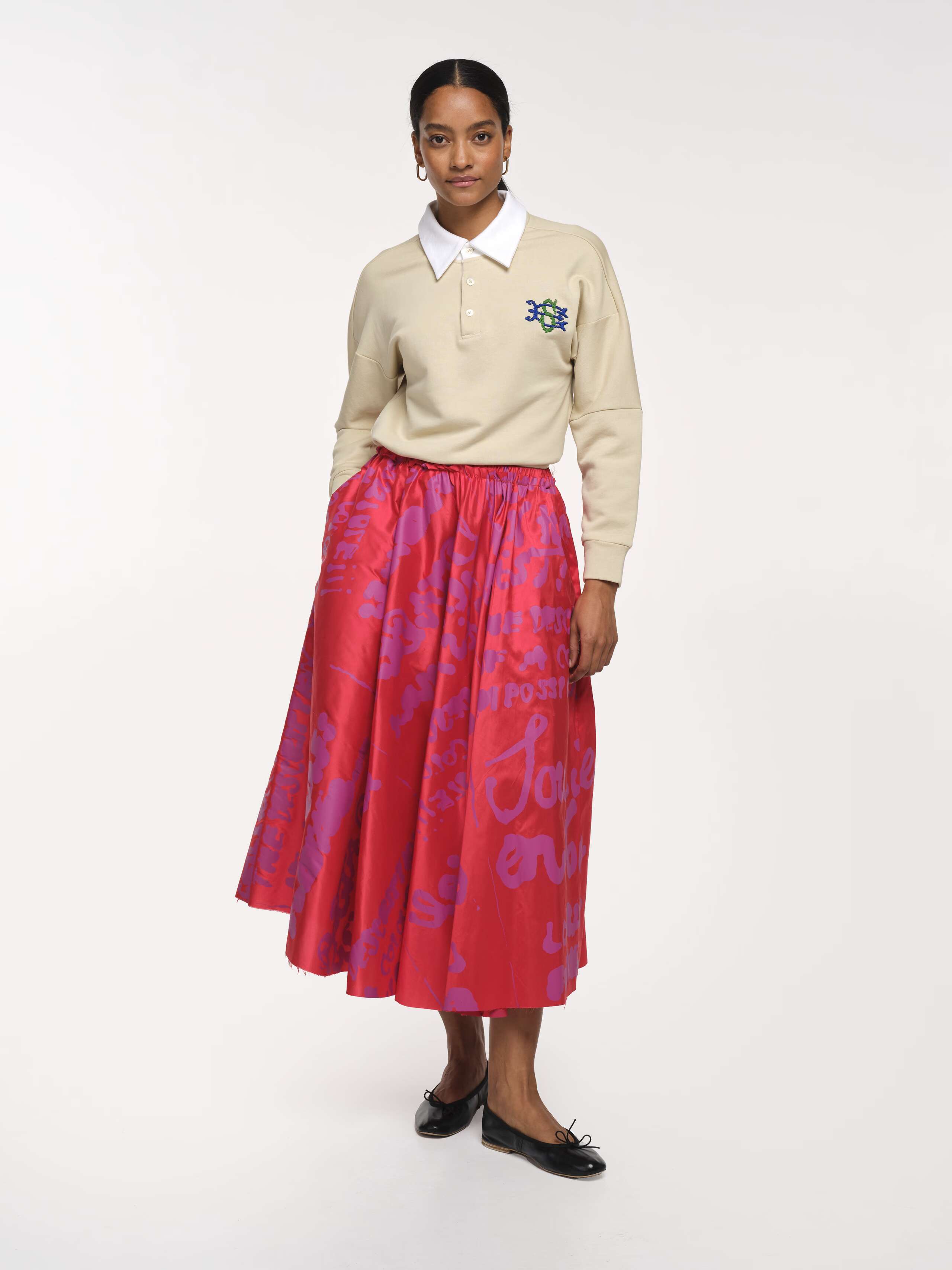 Front Shot of Model wearing Long Berta Skirt Doupion Proverb Lipstick Pink