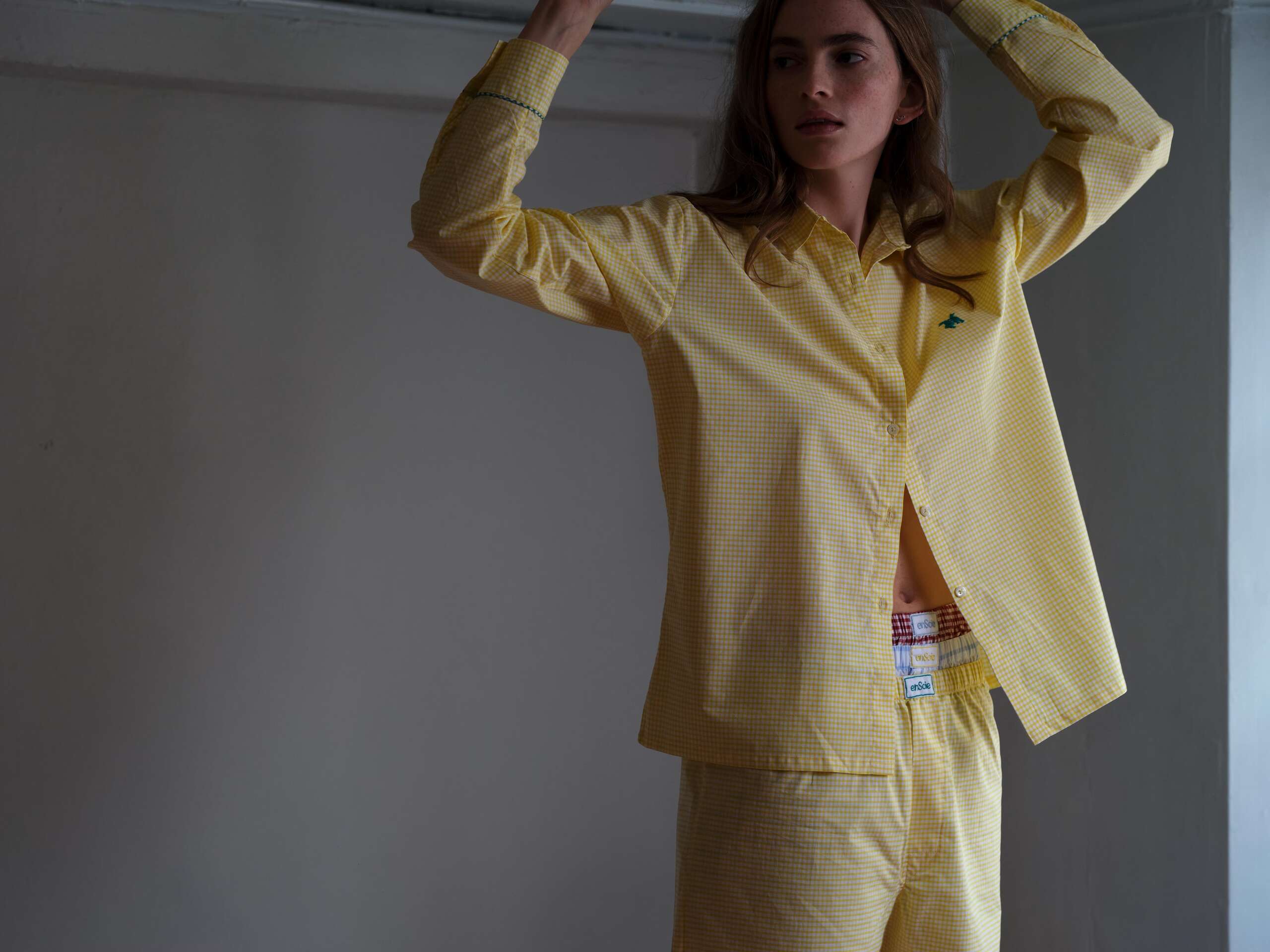 Picture of a young women wearing a yellow cotton pyjama 