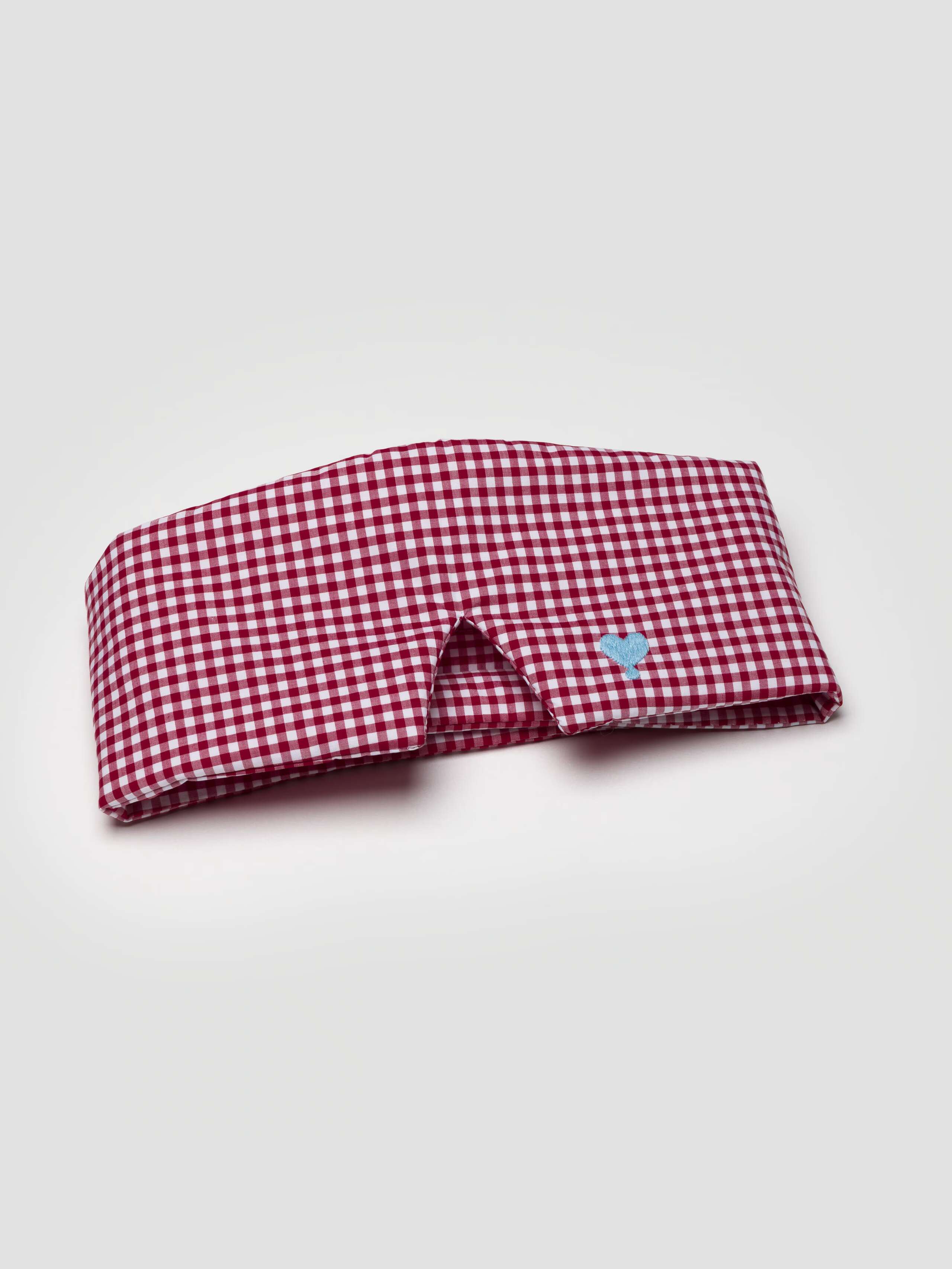 Betty sleep mask in Calm Red Vichy Check with bright blue heart embroidery