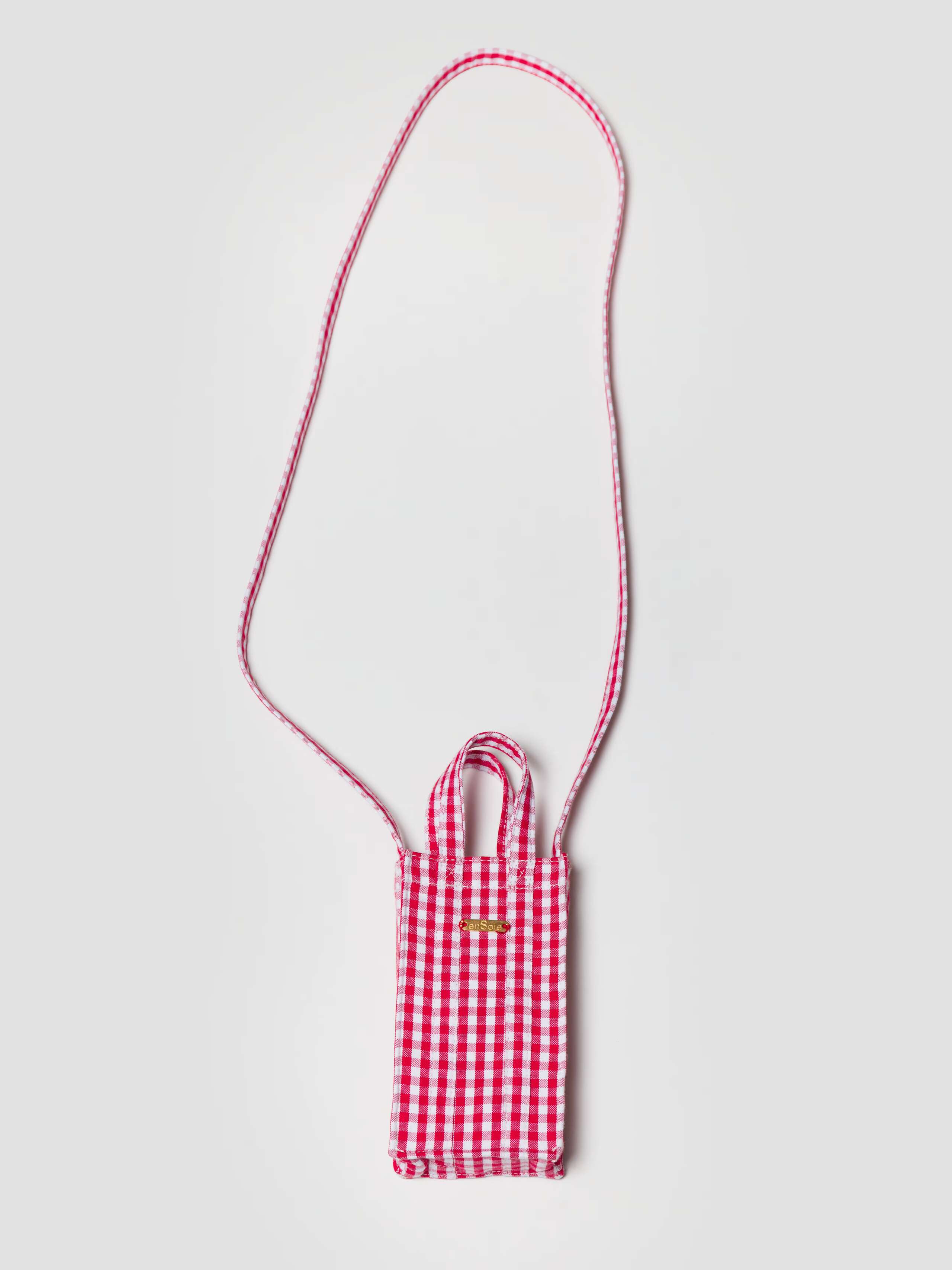 Product Shot of Cabas Phone Bag in Red Vichy