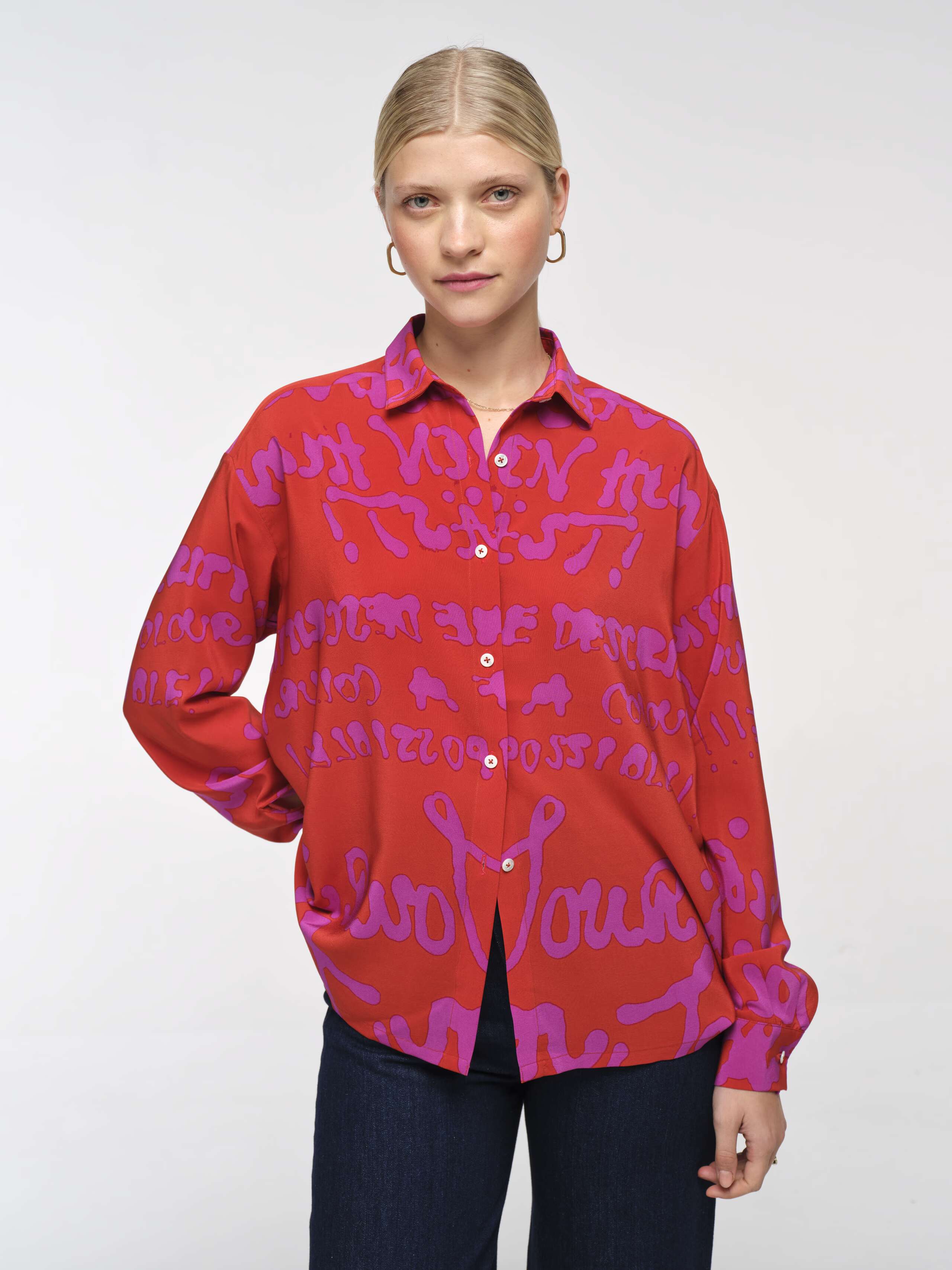 Front Shot of Model wearing Francesca Proverb Blouse in Lipstick Pink