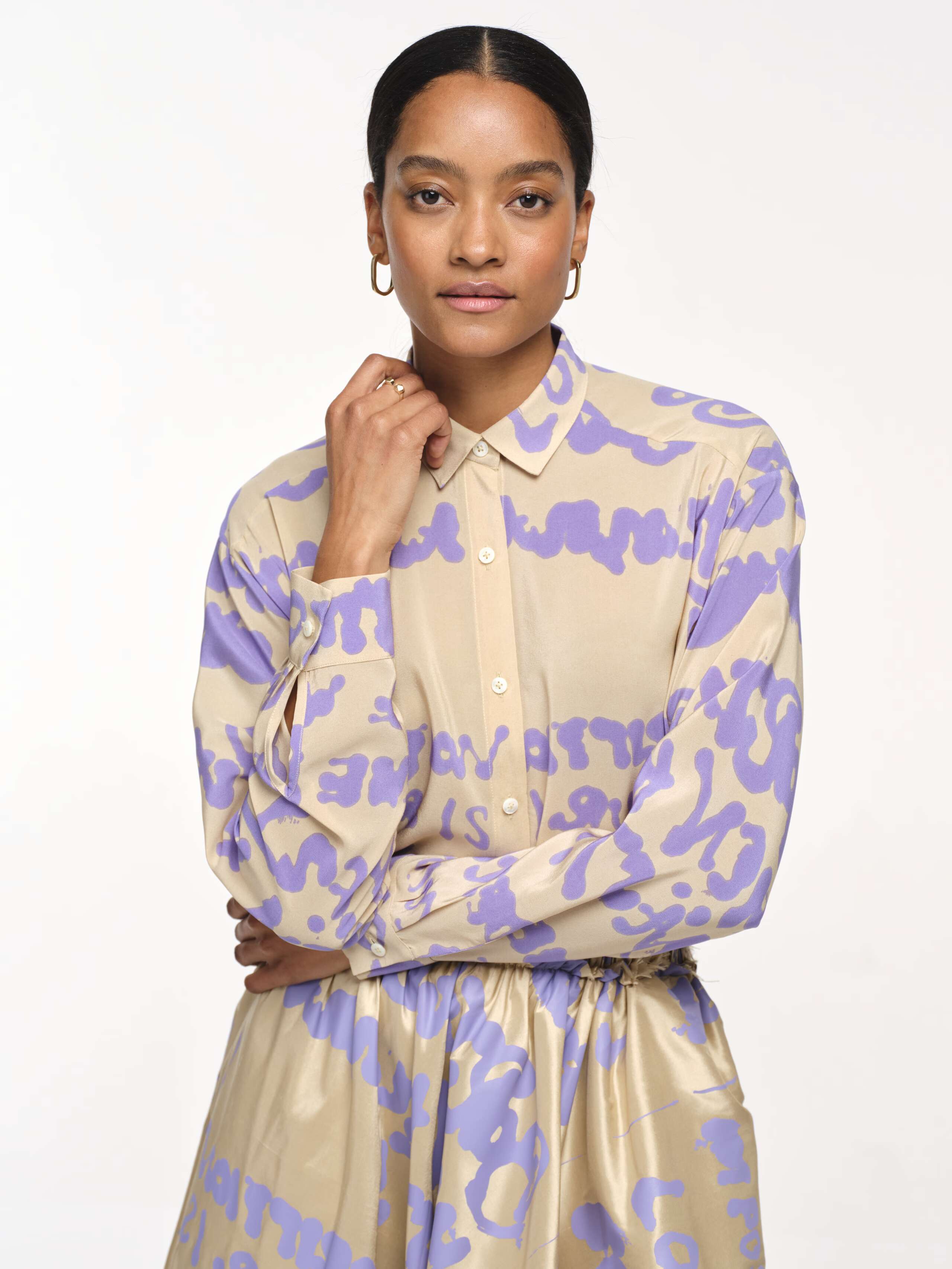 Closeup Front Shot of Model wearing Francesca Proverb Blouse in Beige