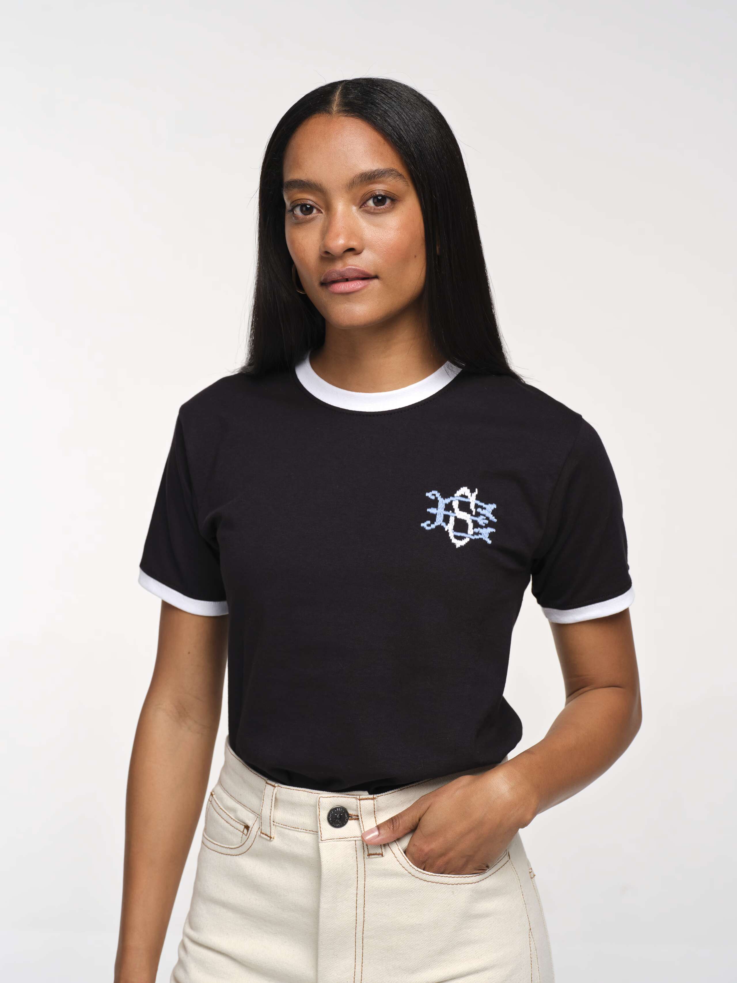 Front Closeup Shot of Model Wearing Round Sleeve Pixel Shirt in Black with ES Embroidery 
